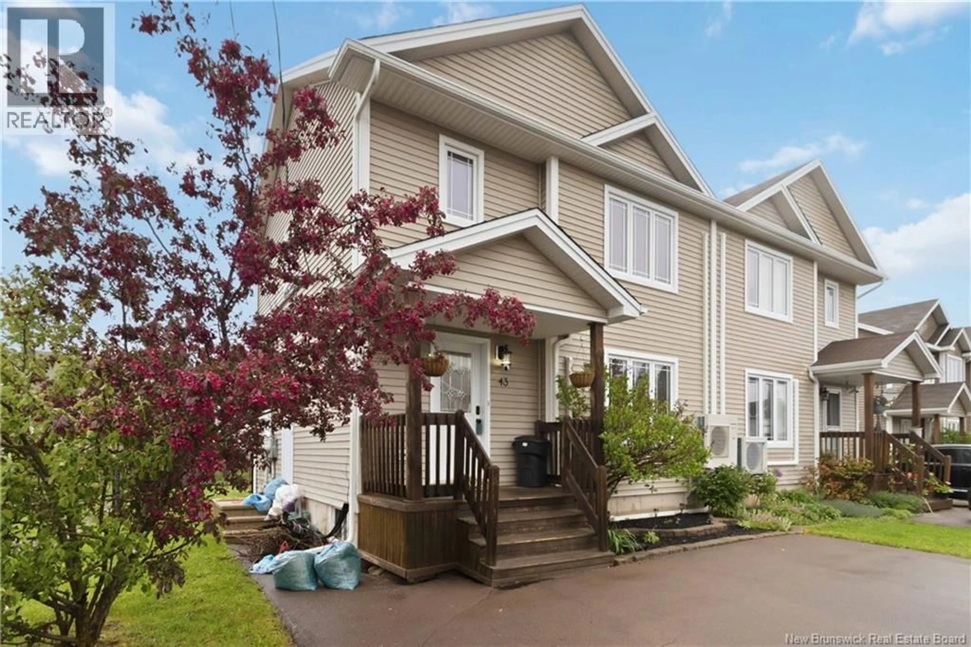 Home with vinyl exterior material, street for 43 NUGENT STREET, Dieppe New Brunswick E1A0S7