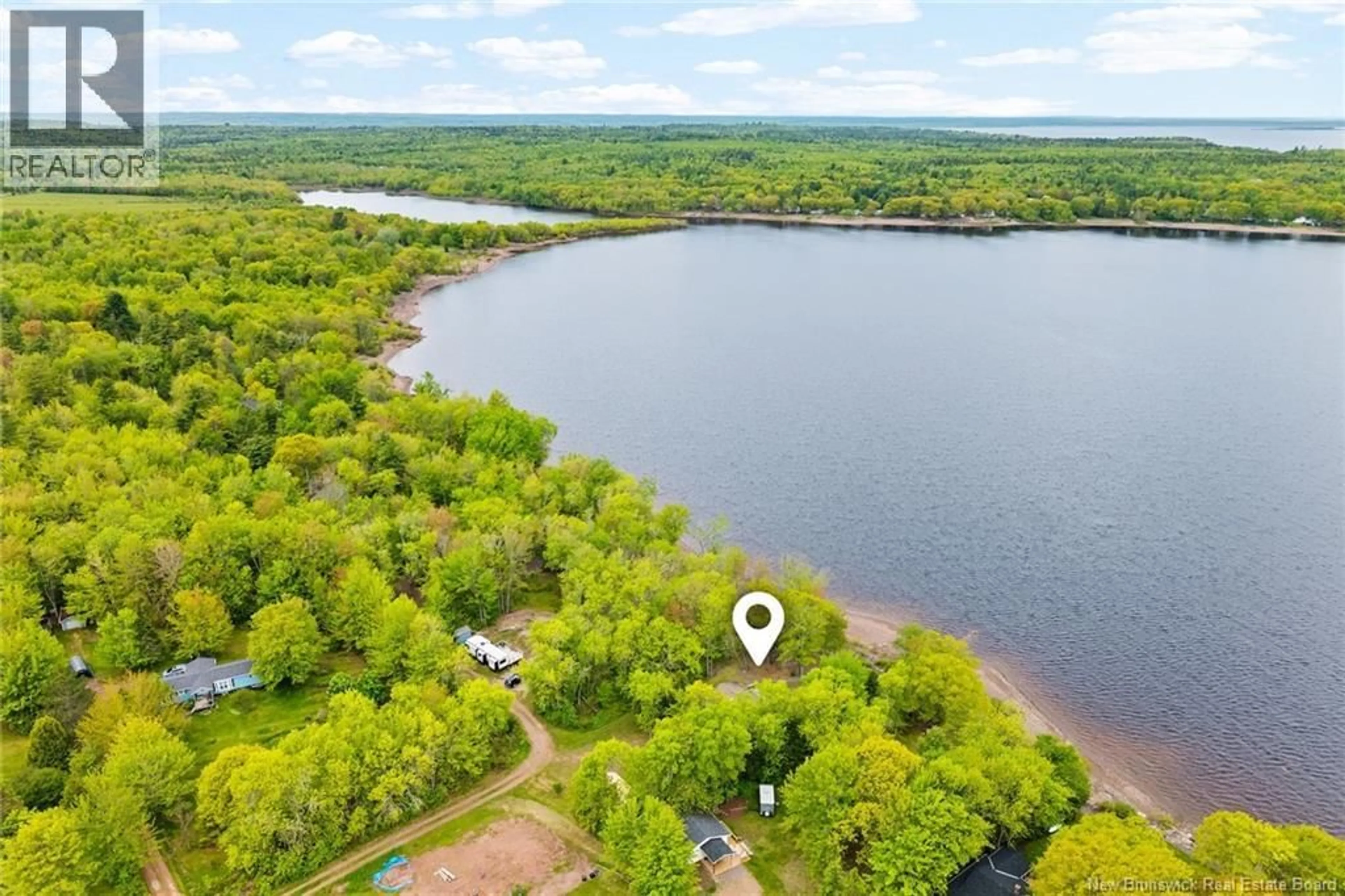 A pic from outside/outdoor area/front of a property/back of a property/a pic from drone, water/lake/river/ocean view for 22 GRANDVIEW COURT, Whites Cove New Brunswick E4C3A8