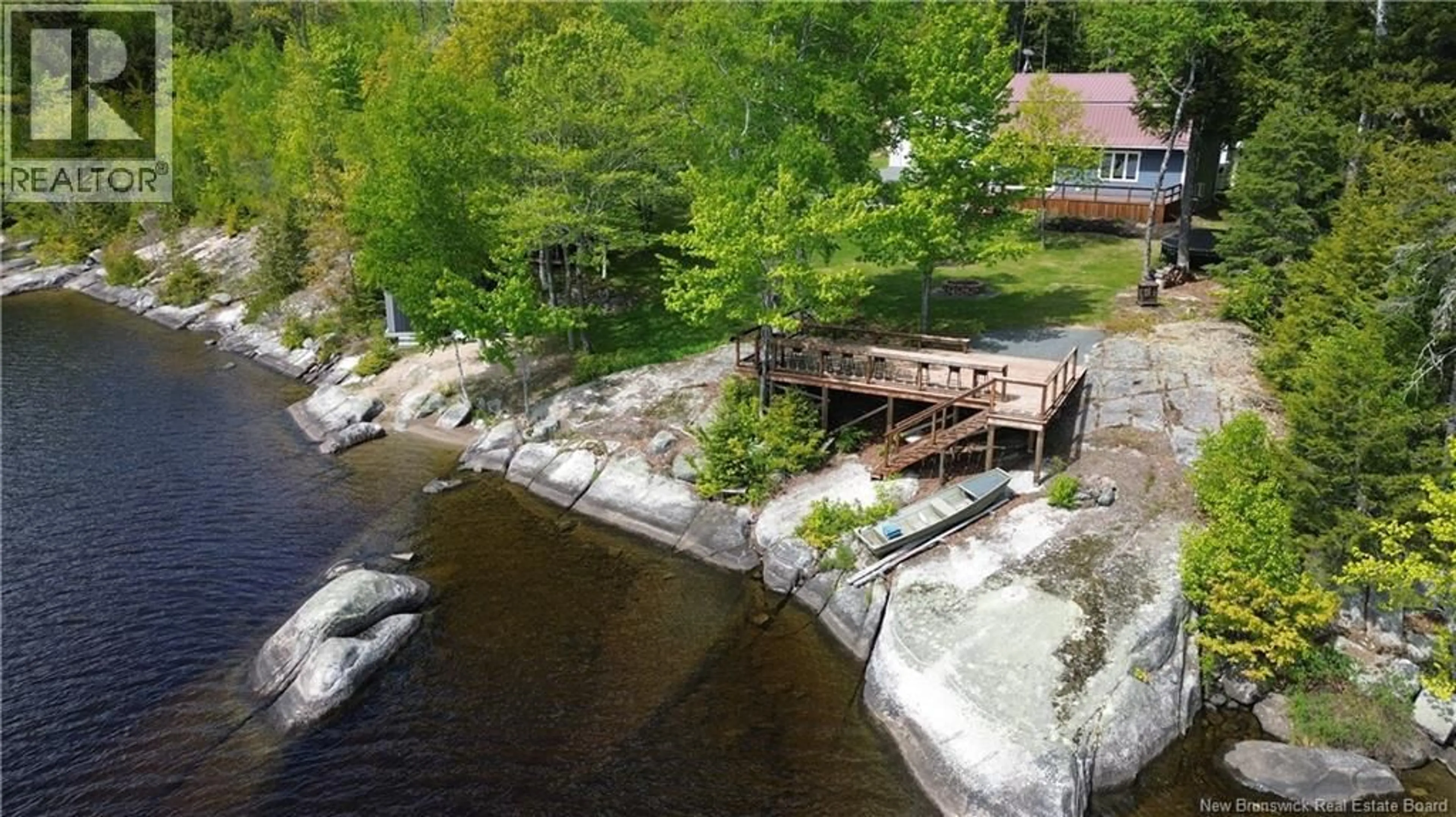 A pic from outside/outdoor area/front of a property/back of a property/a pic from drone, water/lake/river/ocean view for 229 SECOND EEL RIVER LANE, Eel River Lake New Brunswick E6H0B5