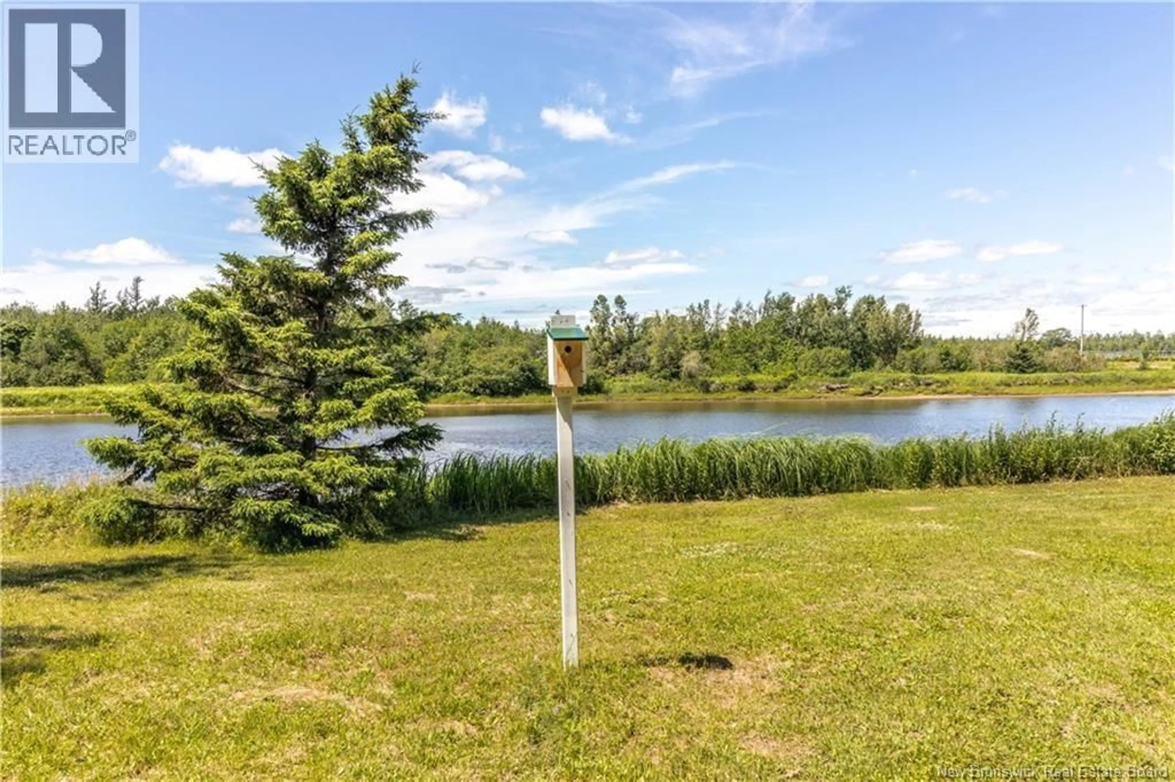 A pic from outside/outdoor area/front of a property/back of a property/a pic from drone, water/lake/river/ocean view for 30 EVANGELINE, Richibucto New Brunswick E4W3Z6