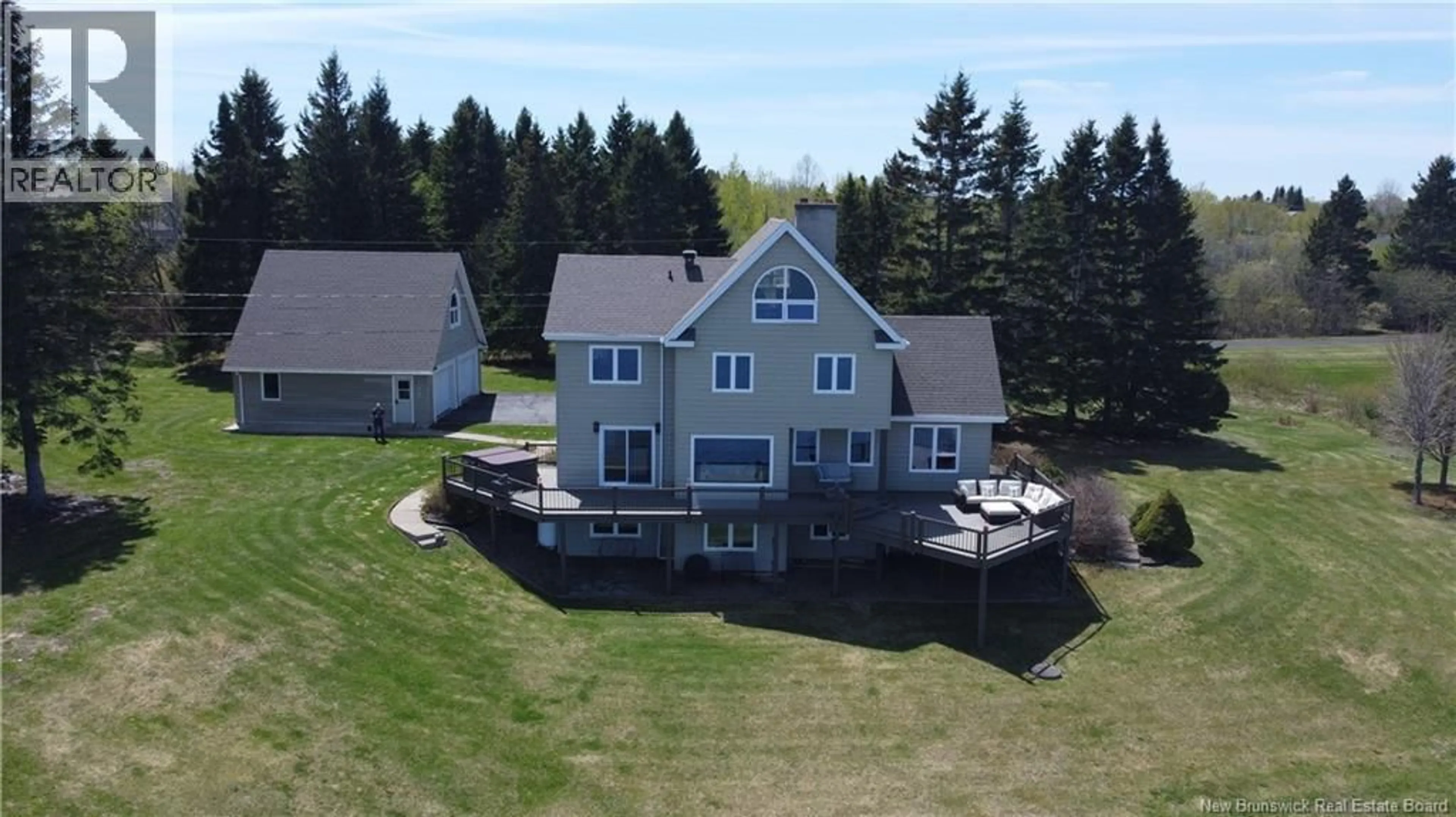 A pic from outside/outdoor area/front of a property/back of a property/a pic from drone, water/lake/river/ocean view for 30 REID ROAD, Charlo New Brunswick E8E2R2