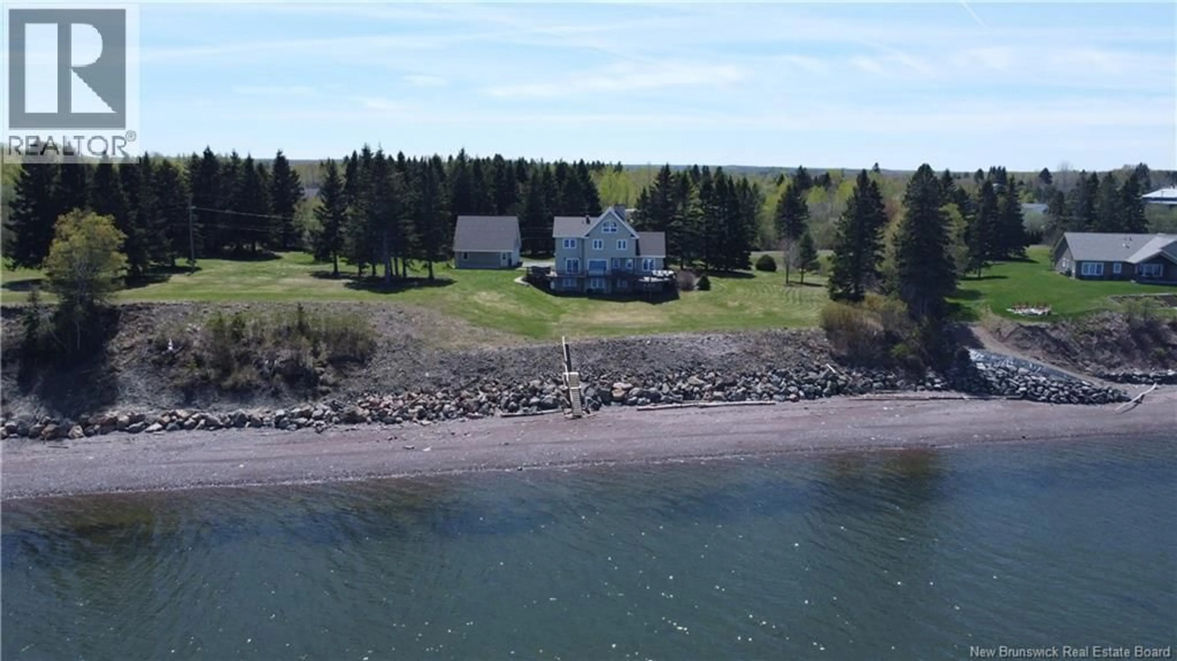 A pic from outside/outdoor area/front of a property/back of a property/a pic from drone, water/lake/river/ocean view for 30 REID ROAD, Charlo New Brunswick E8E2R2