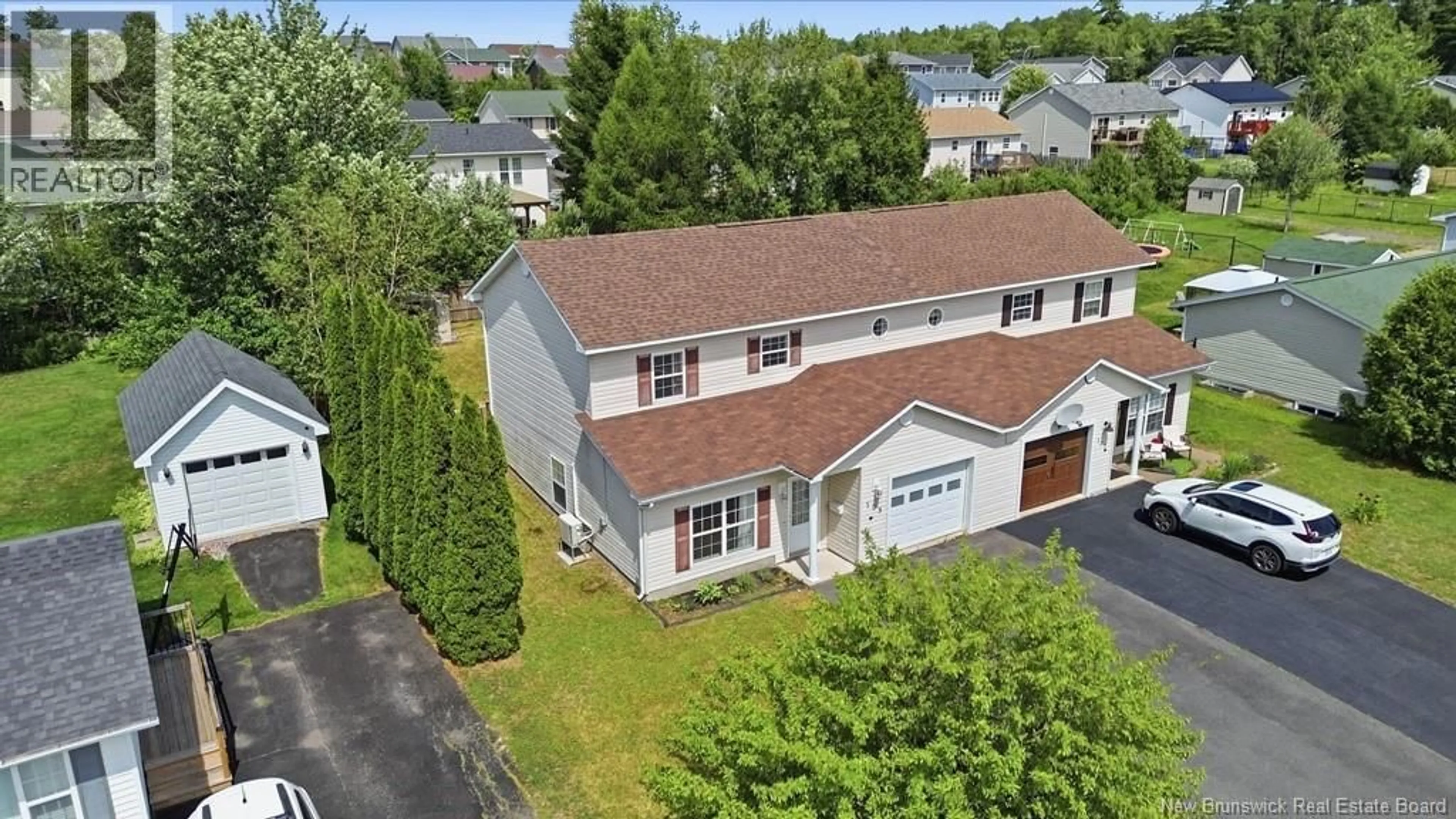 A pic from outside/outdoor area/front of a property/back of a property/a pic from drone, street for 105 FINNAMORE STREET, Oromocto New Brunswick E2V2R5