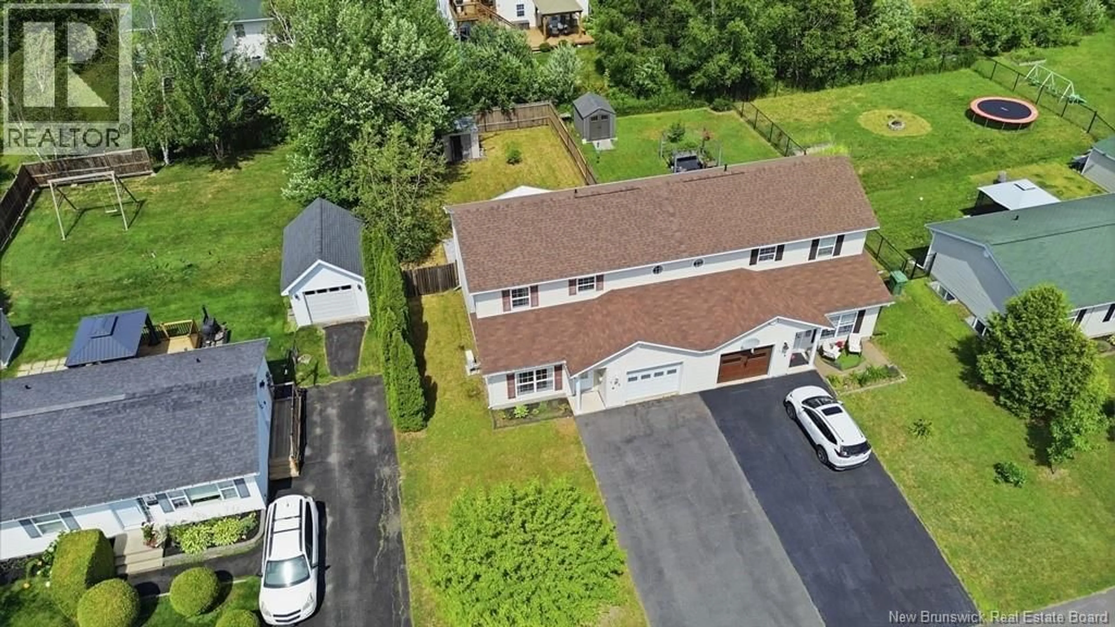 A pic from outside/outdoor area/front of a property/back of a property/a pic from drone, street for 105 FINNAMORE STREET, Oromocto New Brunswick E2V2R5