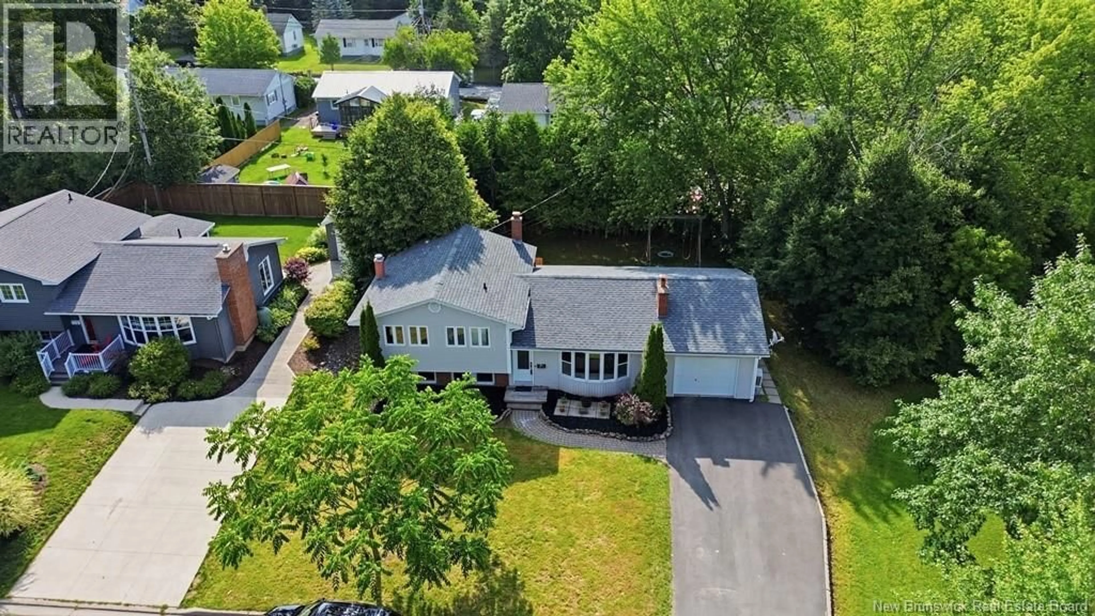 A pic from outside/outdoor area/front of a property/back of a property/a pic from drone, street for 108 MADDISON AVENUE, Fredericton New Brunswick E3A2N4