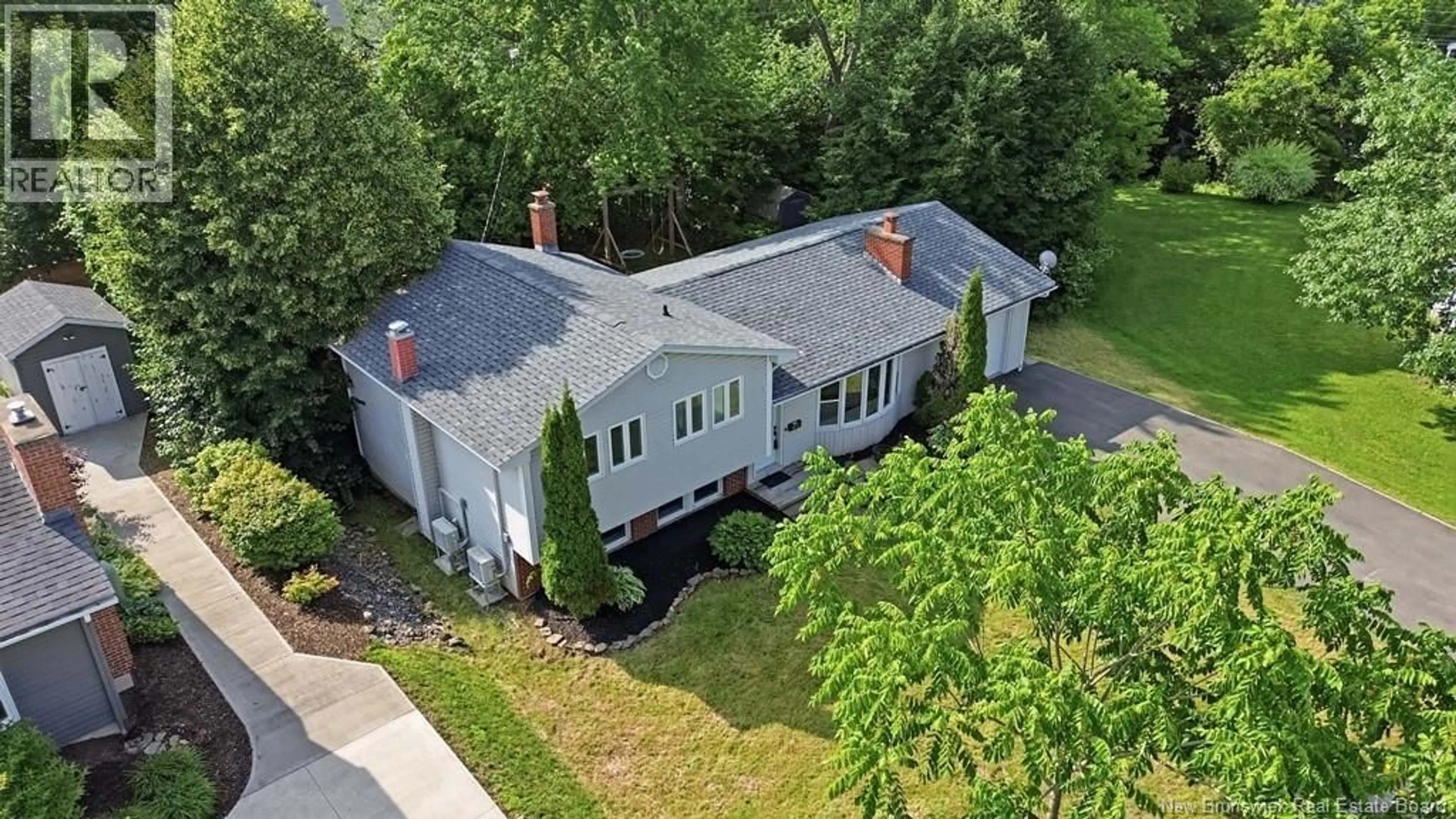 A pic from outside/outdoor area/front of a property/back of a property/a pic from drone, street for 108 MADDISON AVENUE, Fredericton New Brunswick E3A2N4