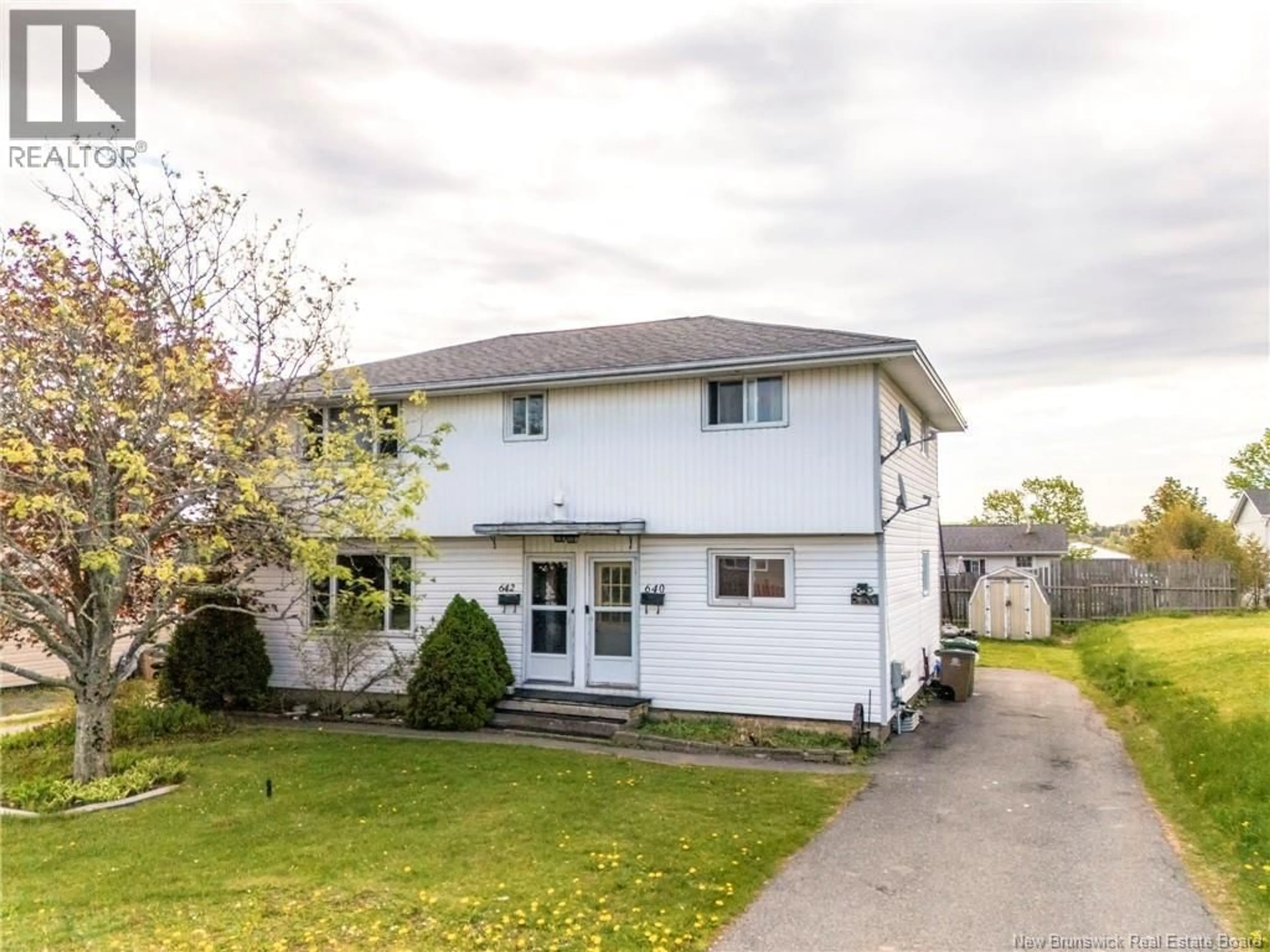 A pic from outside/outdoor area/front of a property/back of a property/a pic from drone, street for 640-642 MICHAEL CRESCENT, Saint John New Brunswick E2J2T1
