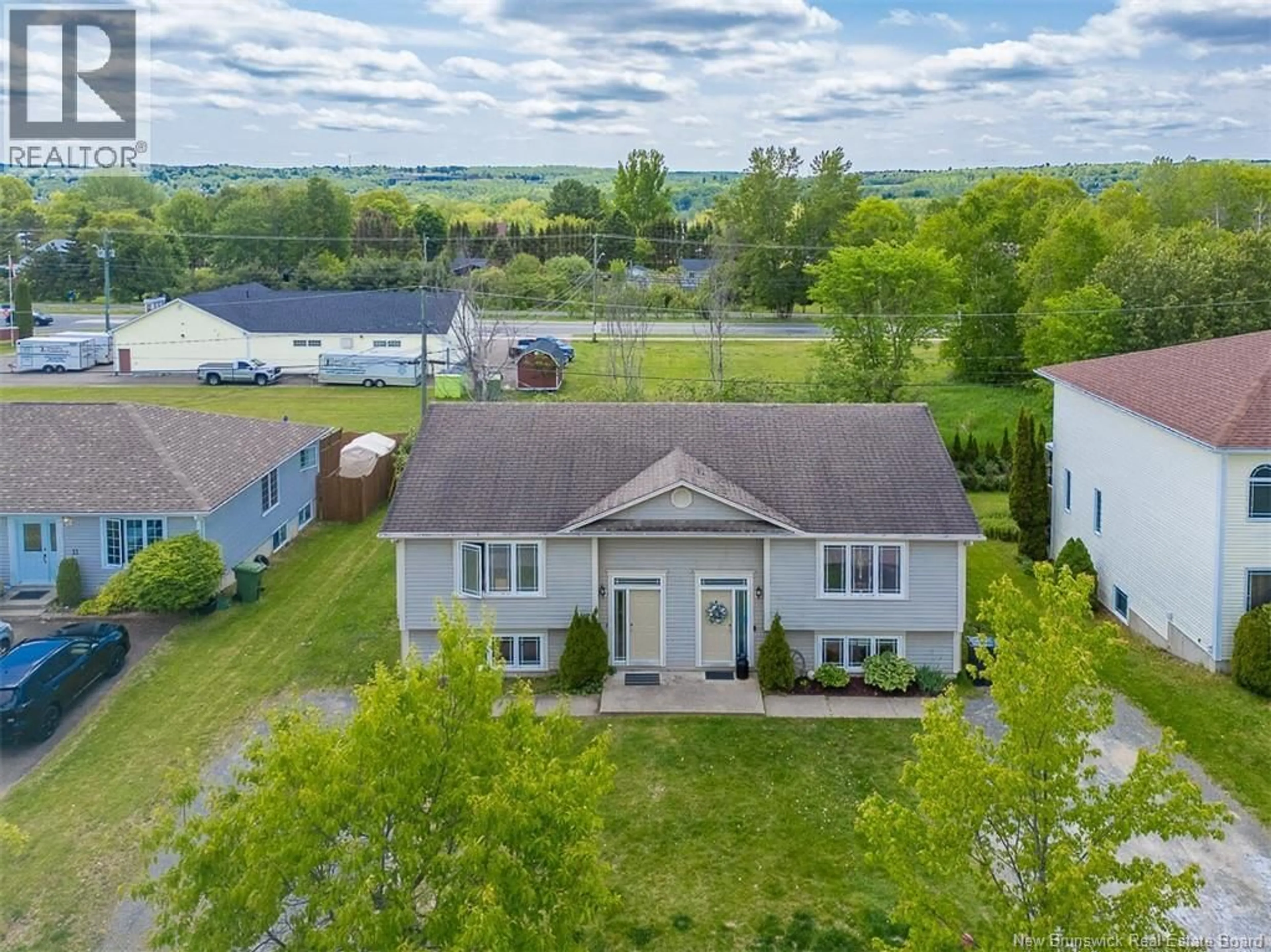 A pic from outside/outdoor area/front of a property/back of a property/a pic from drone, water/lake/river/ocean view for 17-19 KATRINA DRIVE, Fredericton New Brunswick E3G0B1