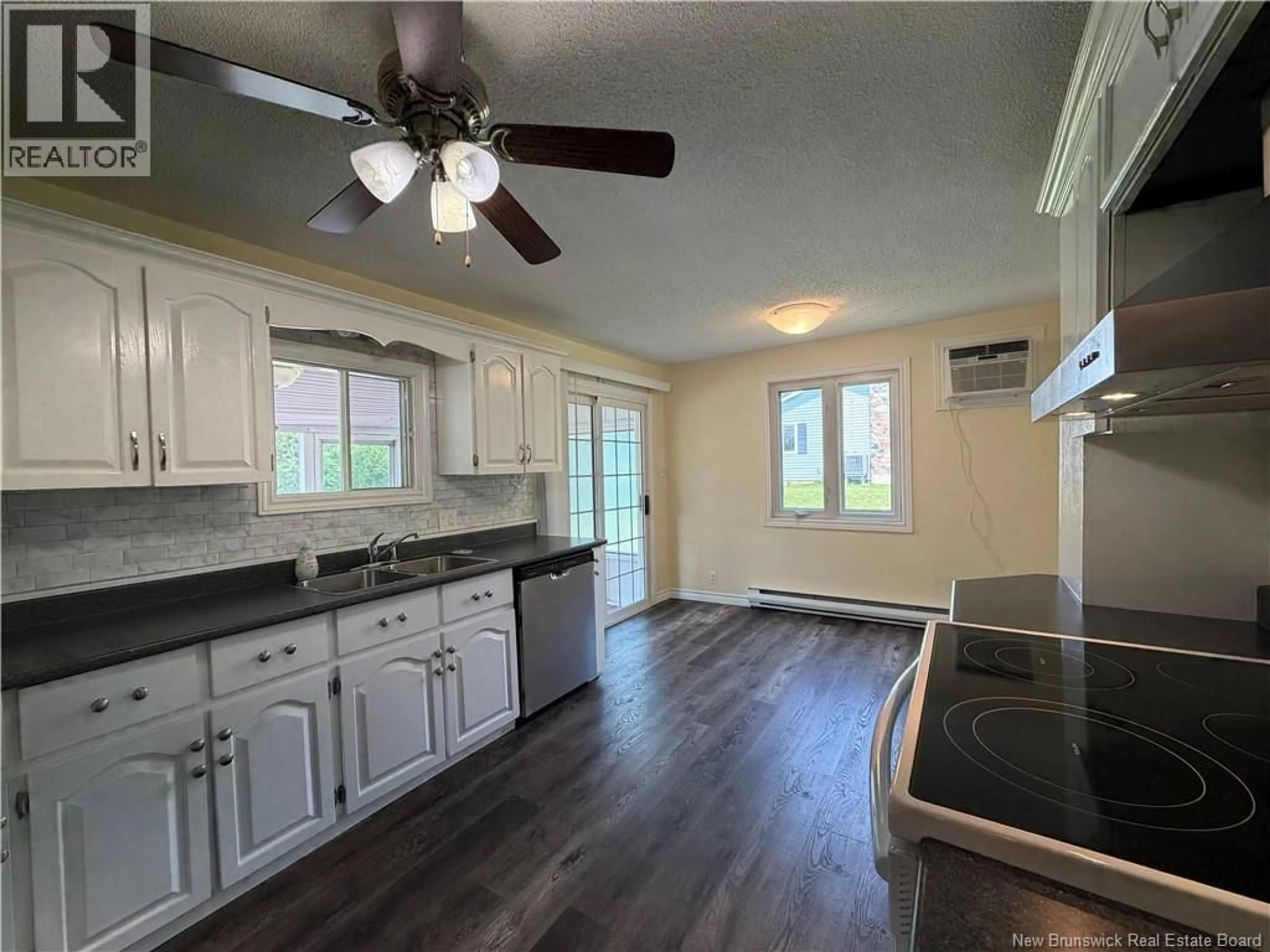 Open concept kitchen, wood/laminate floor for 289 PERCY KELLY DRIVE, Miramichi New Brunswick E1V5V5