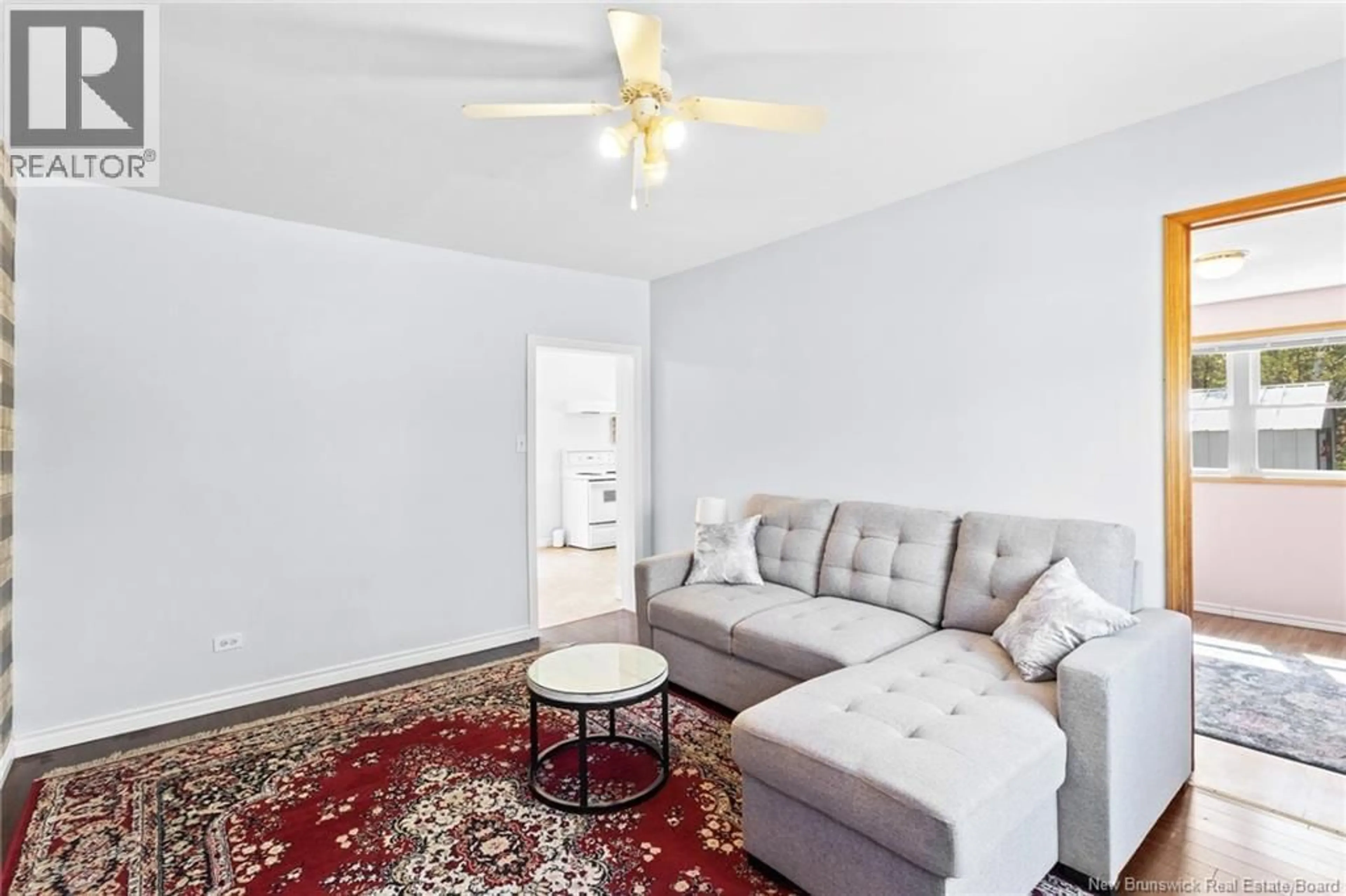Living room with furniture, unknown for 23 OAK STREET, Minto New Brunswick E4B3C4