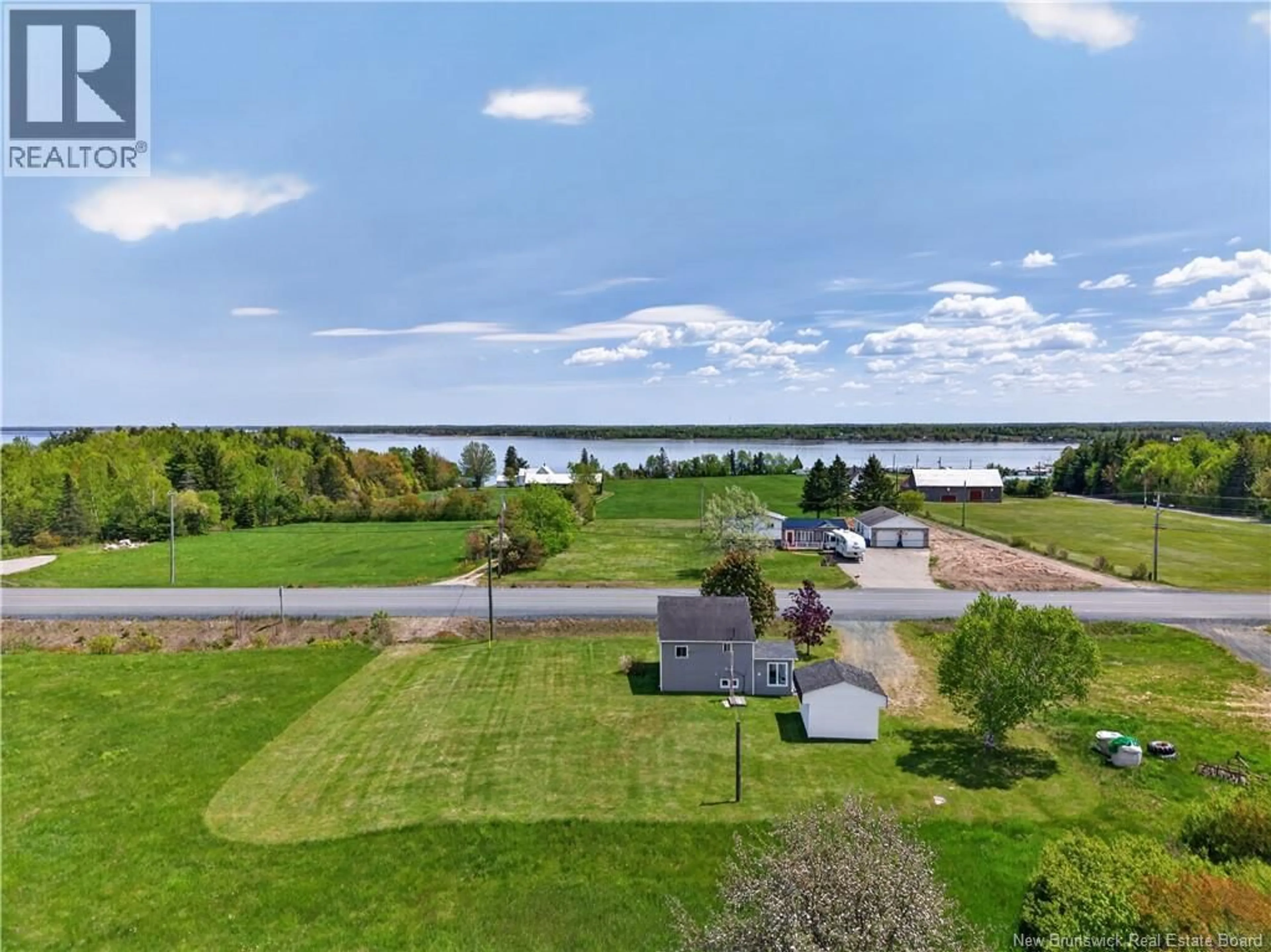 A pic from outside/outdoor area/front of a property/back of a property/a pic from drone, water/lake/river/ocean view for 517 ROUTE 11 HWY, Lower Newcastle New Brunswick E1V7G2