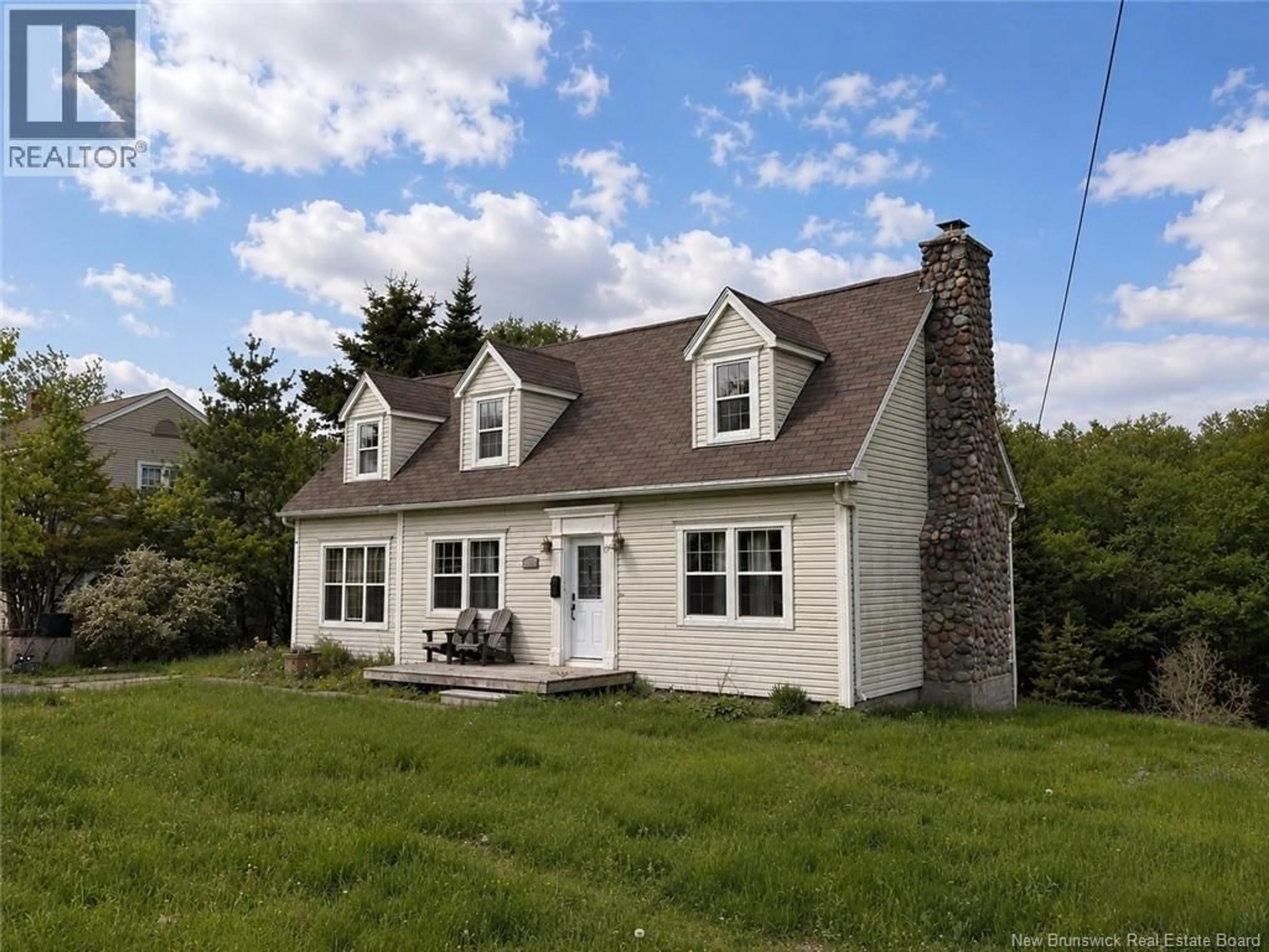 Home with vinyl exterior material, street for 1018 DEVER ROAD, Saint John New Brunswick E2M4J3