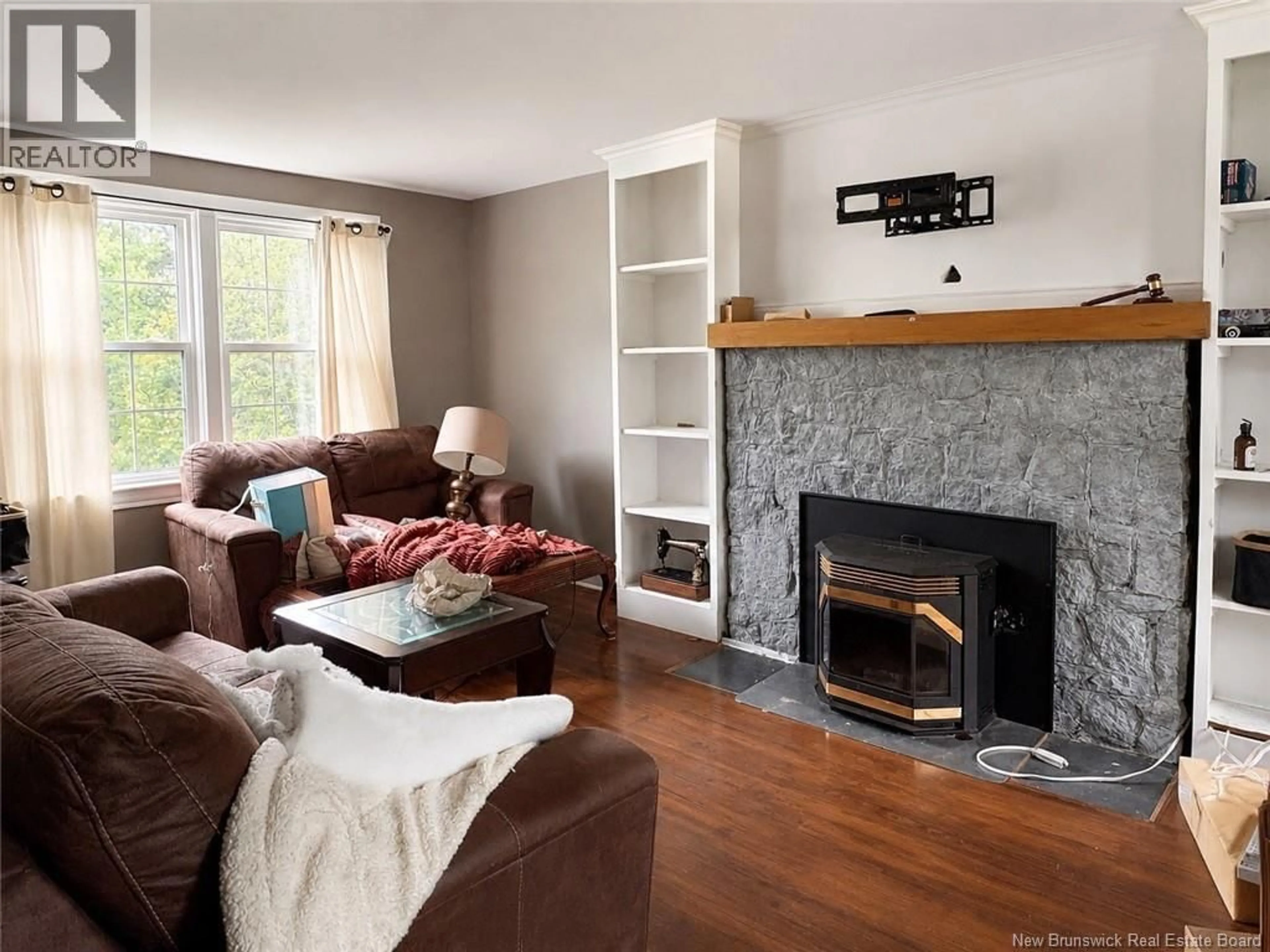 Living room with furniture, wood/laminate floor for 1018 DEVER ROAD, Saint John New Brunswick E2M4J3