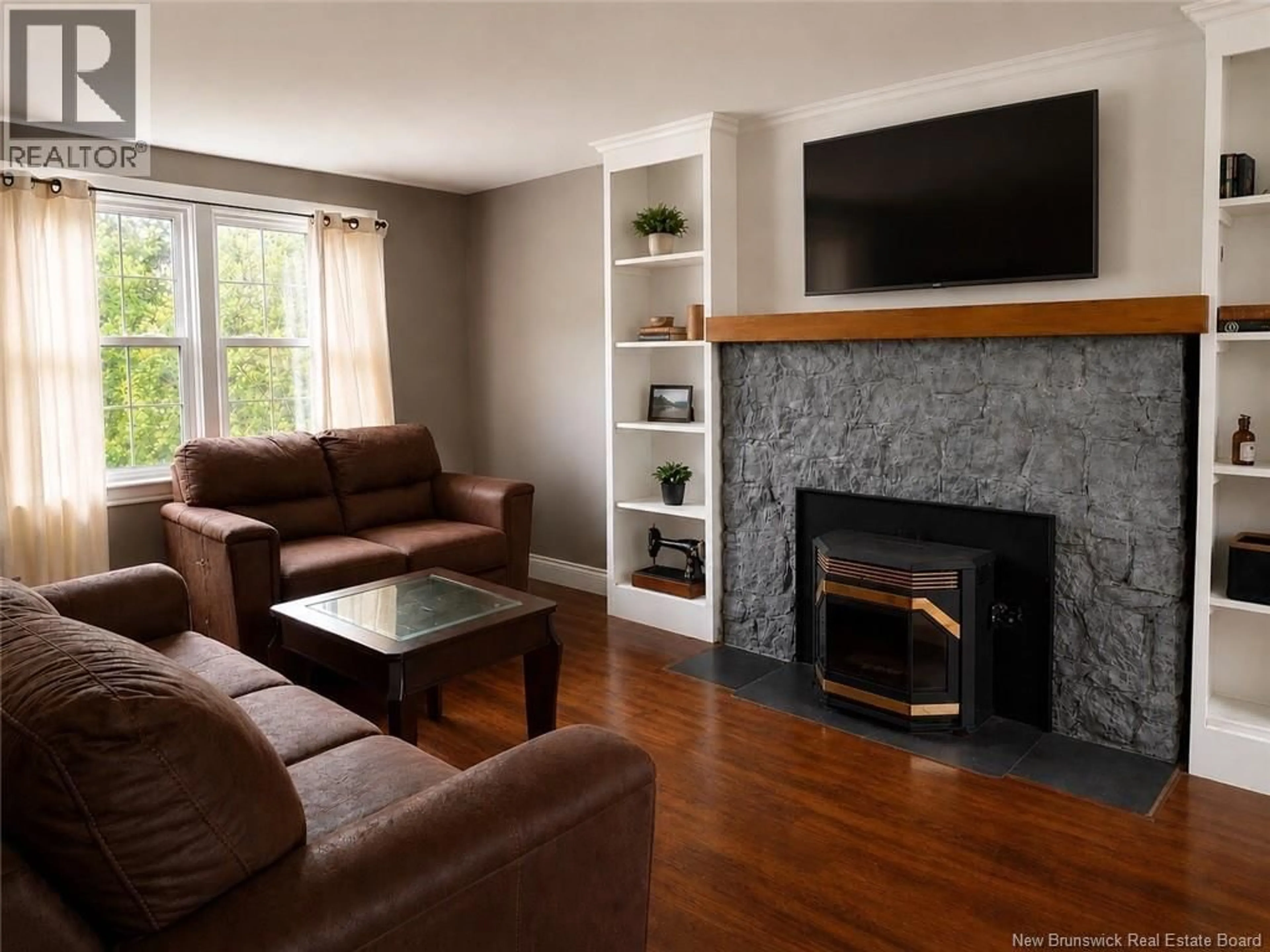 Living room with furniture, wood/laminate floor for 1018 DEVER ROAD, Saint John New Brunswick E2M4J3
