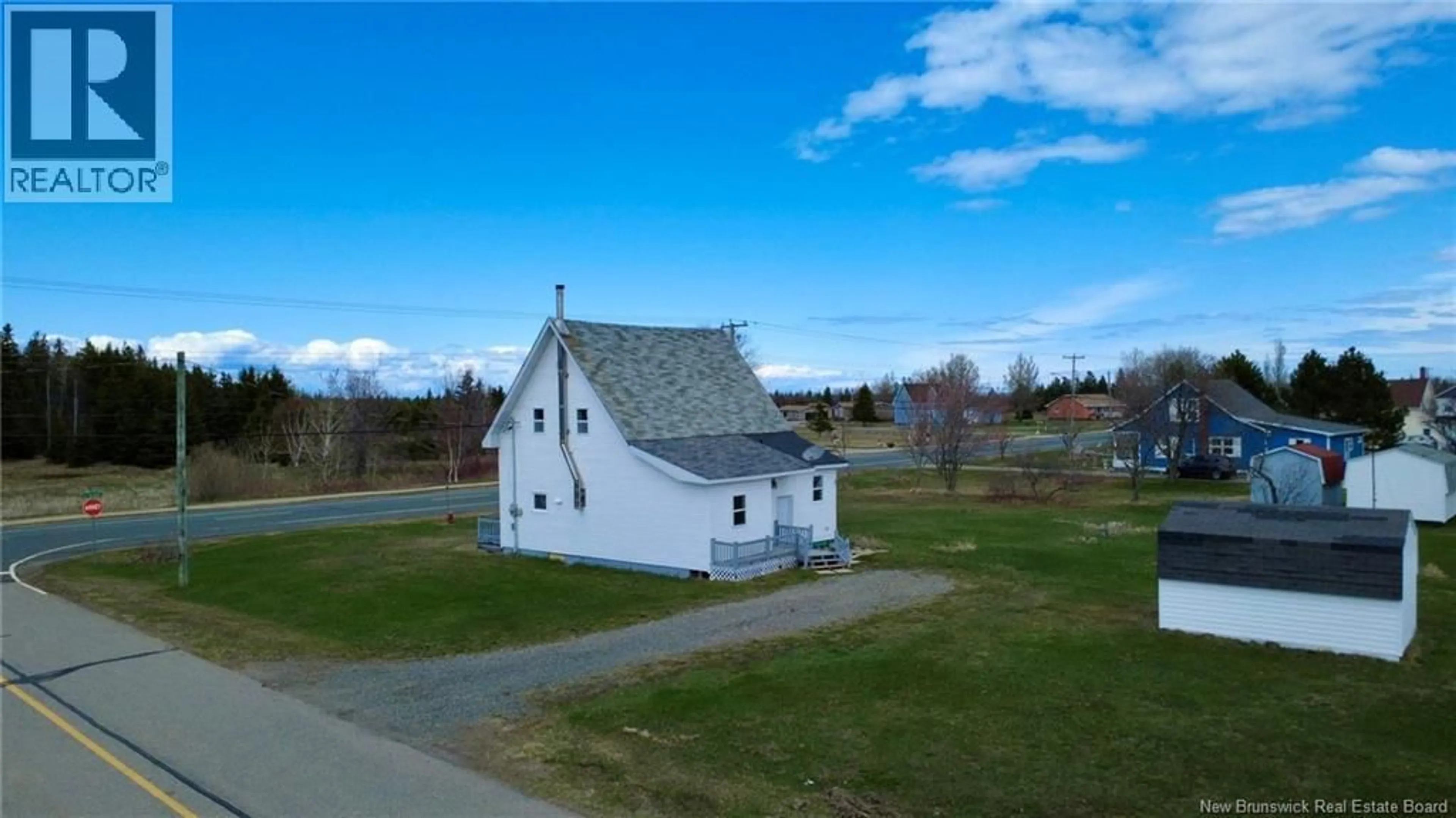 A pic from outside/outdoor area/front of a property/back of a property/a pic from drone, street for 8422 RUE ST-PAUL, Bas-Caraquet New Brunswick E1W6E6