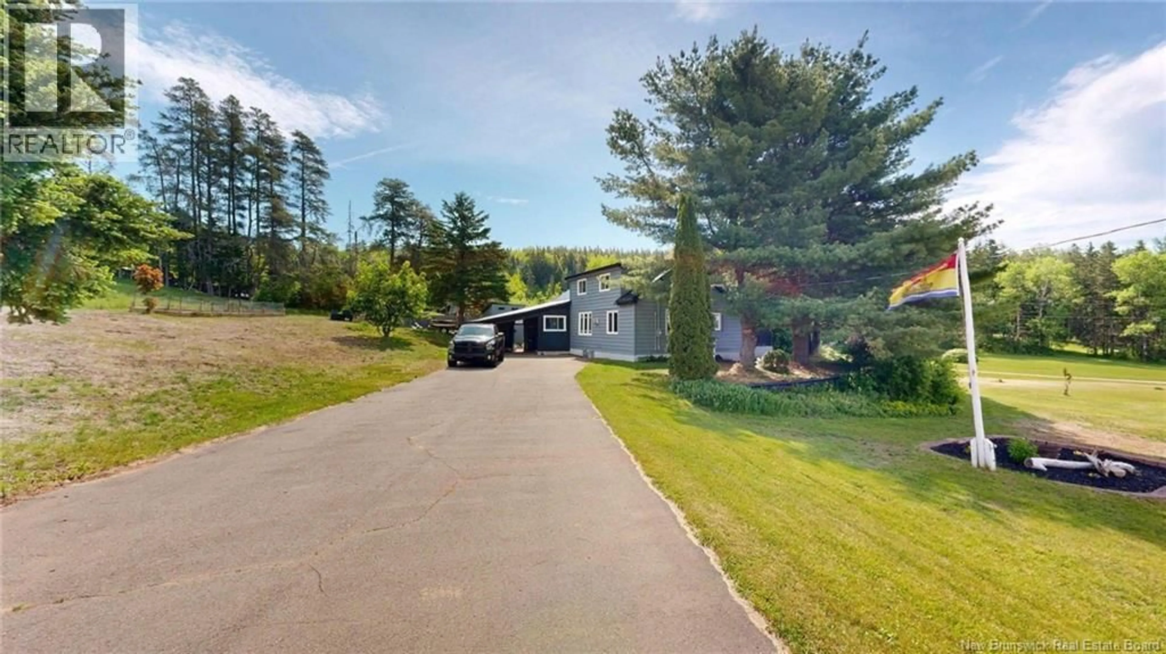 A pic from outside/outdoor area/front of a property/back of a property/a pic from drone, unknown for 310 ROUTE 895, Portage New Brunswick E4Z3E9