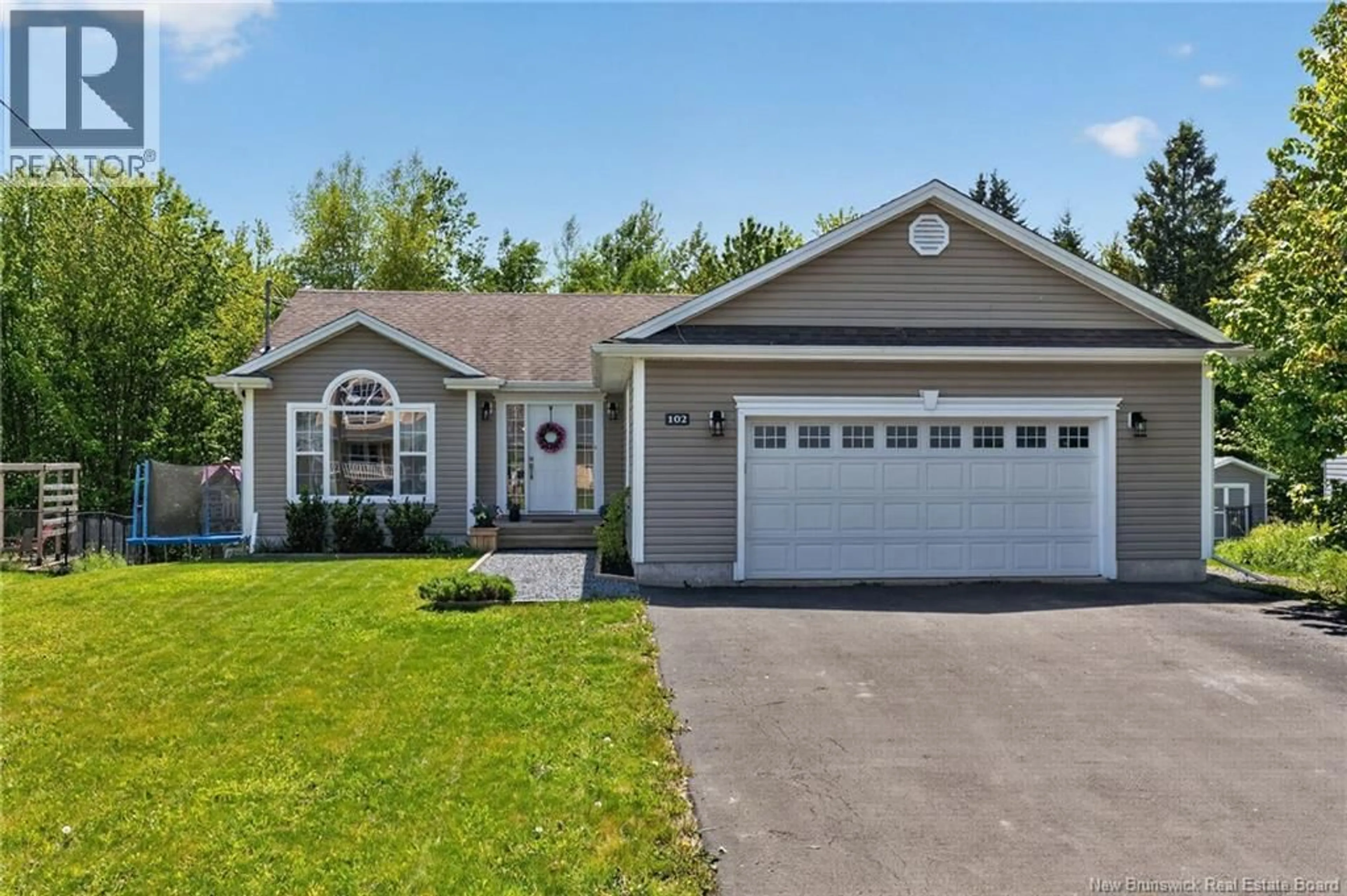 Home with vinyl exterior material, street for 102 ACACIA DRIVE, Moncton New Brunswick E1E0A3