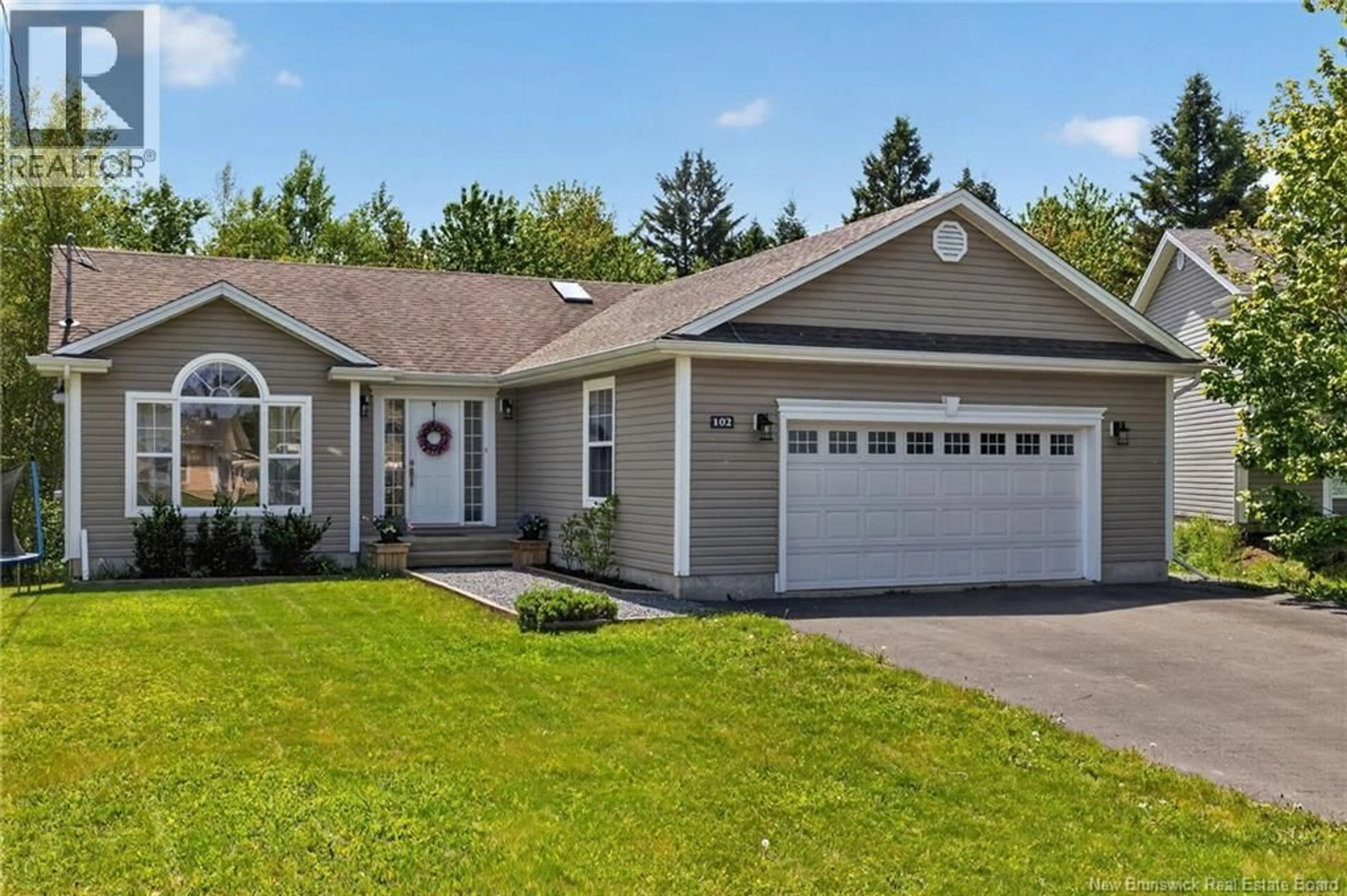 Home with vinyl exterior material, street for 102 ACACIA DRIVE, Moncton New Brunswick E1E0A3