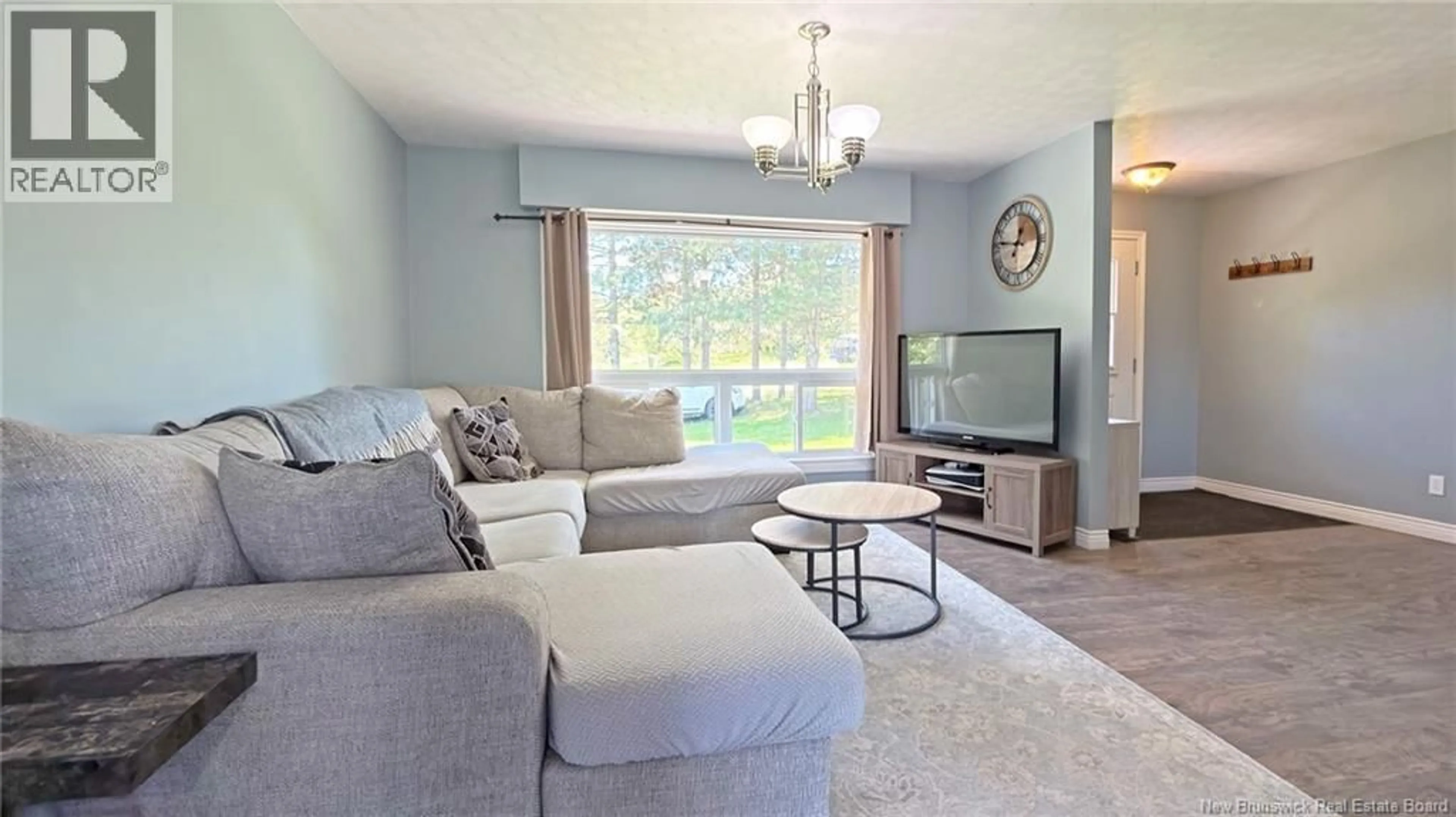 Living room with furniture, wood/laminate floor for 343 ROUTE 102, Burton New Brunswick E2V3C9