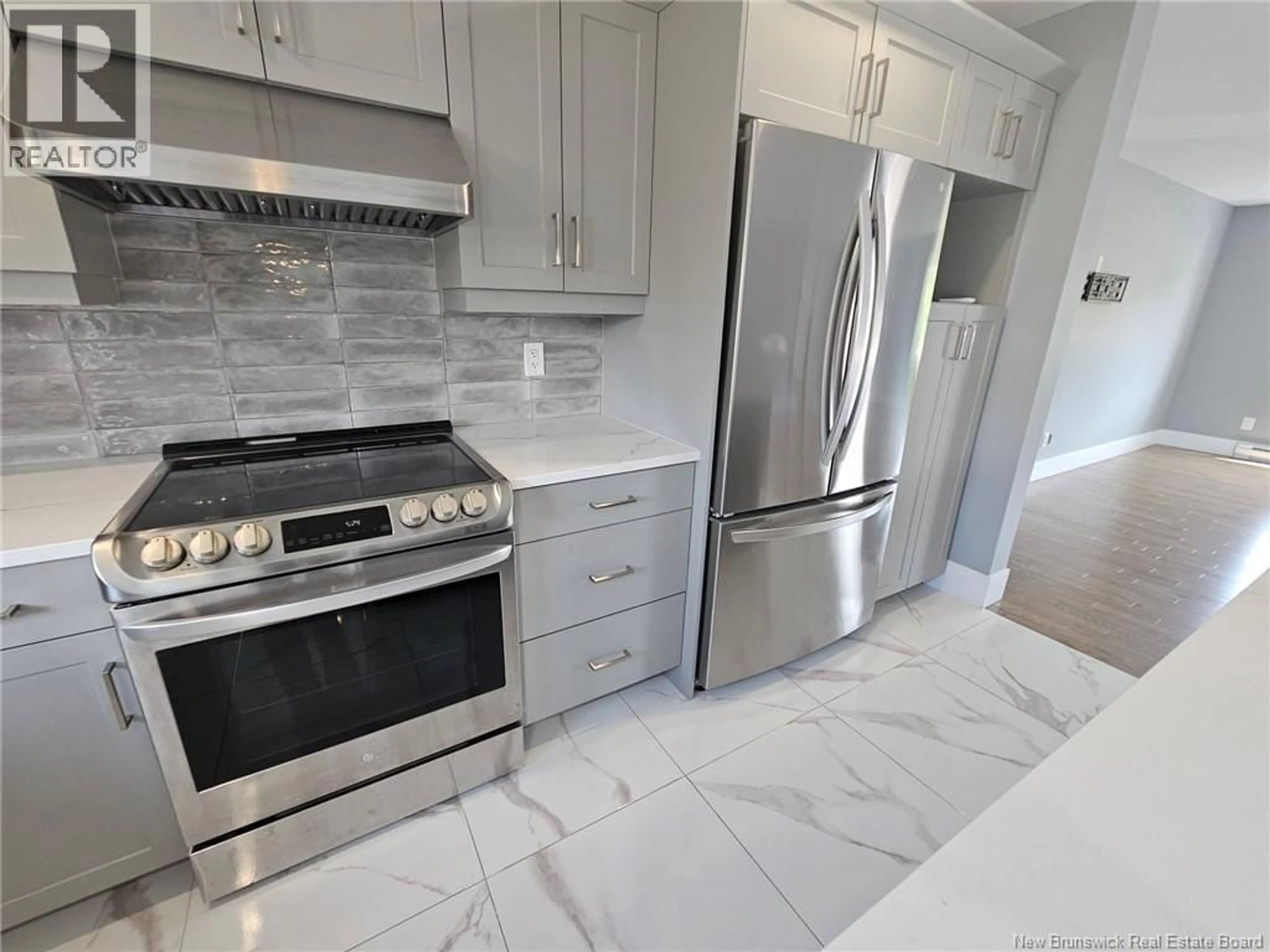 Open concept kitchen, ceramic/tile floor for 94 SALENGRO CRESCENT, Moncton New Brunswick E1E4R7