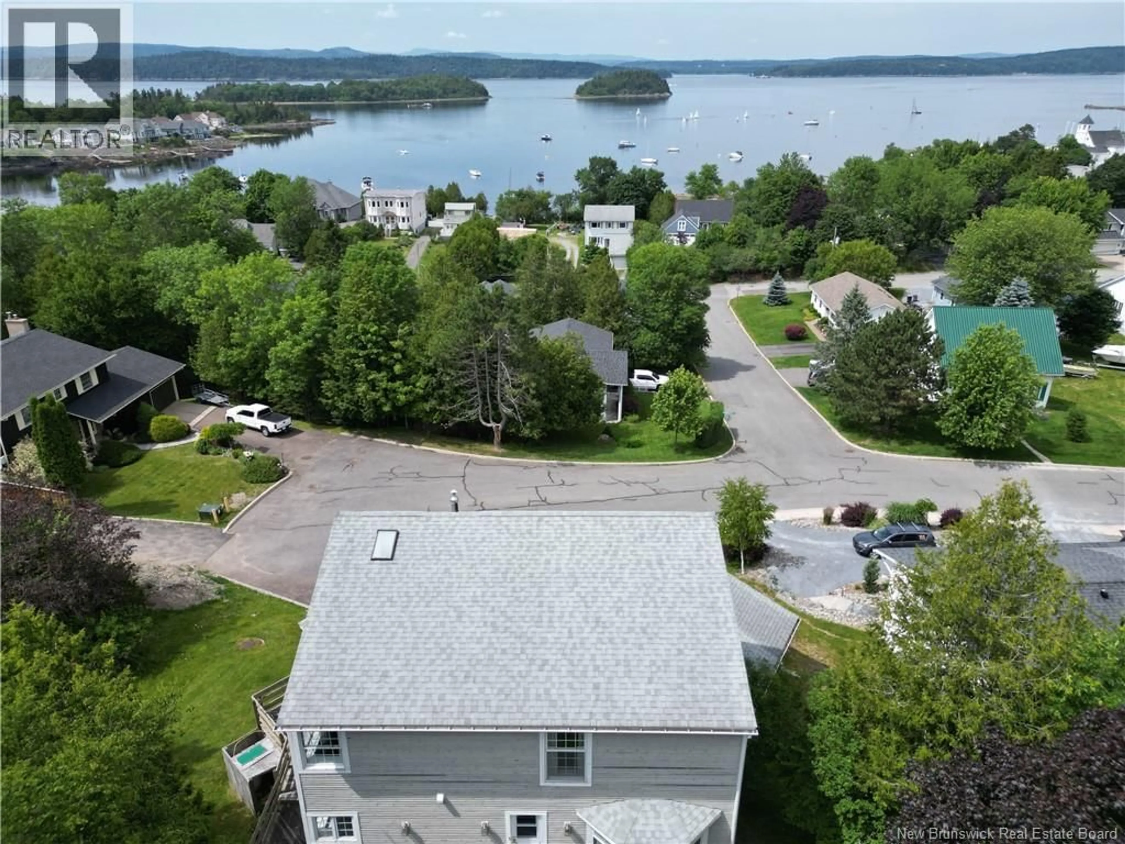 A pic from outside/outdoor area/front of a property/back of a property/a pic from drone, water/lake/river/ocean view for 167 MEADOWBANK AVENUE, Saint John New Brunswick E2K2C9