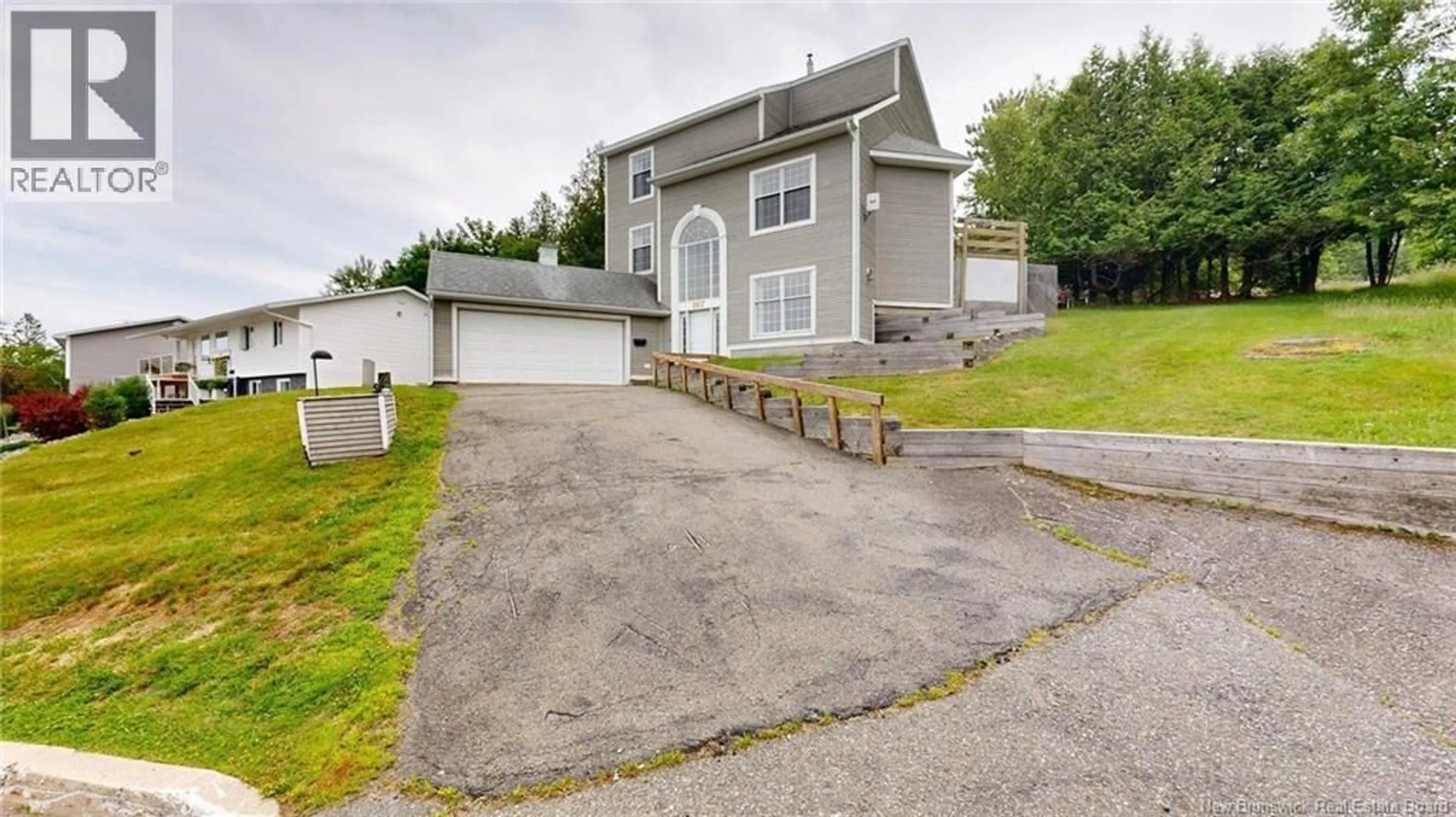 A pic from outside/outdoor area/front of a property/back of a property/a pic from drone, street for 167 MEADOWBANK AVENUE, Saint John New Brunswick E2K2C9