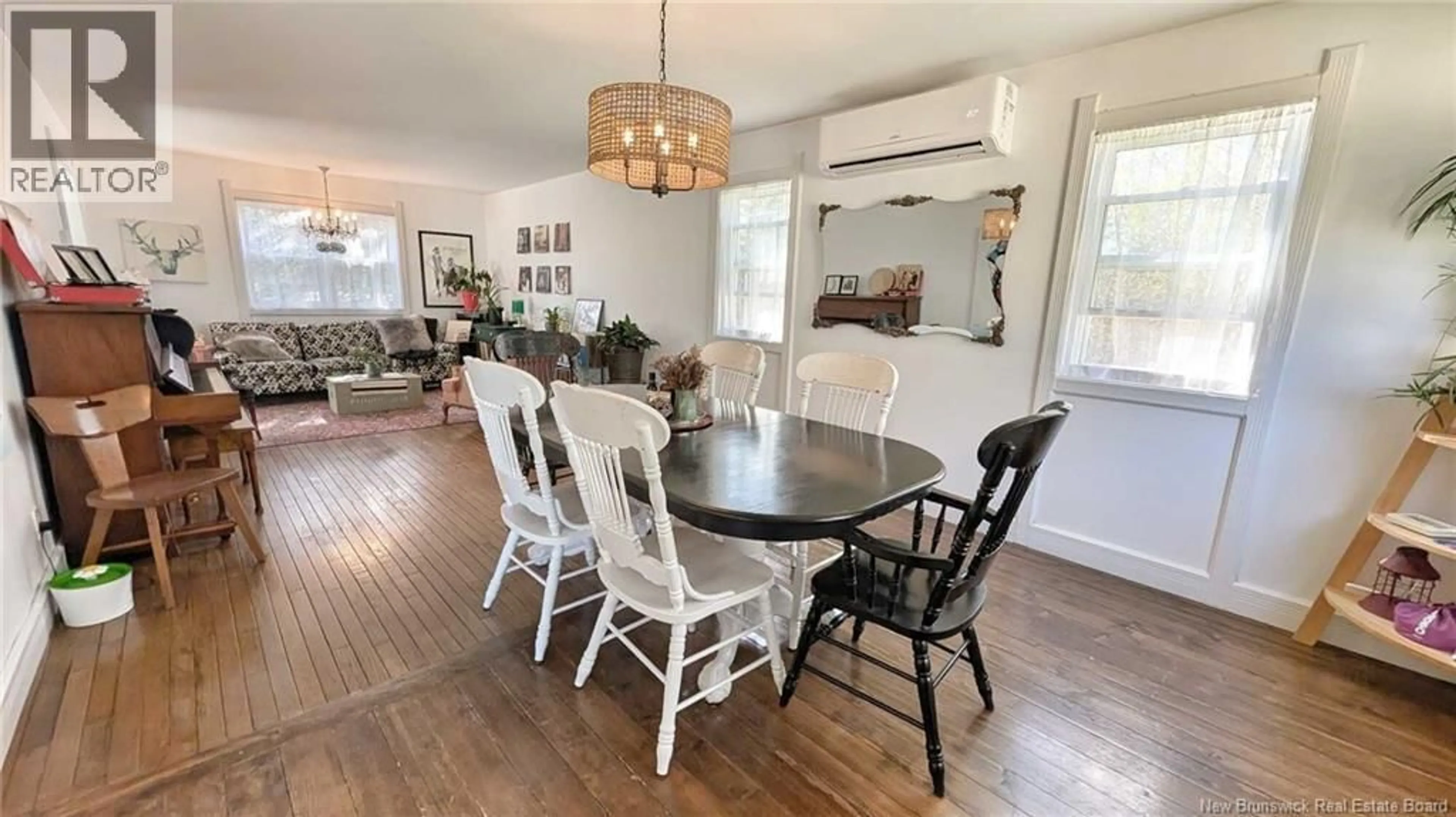 Dining room, wood/laminate floor for 22 RUE DU PONT STREET, Bertrand New Brunswick E1W1J2