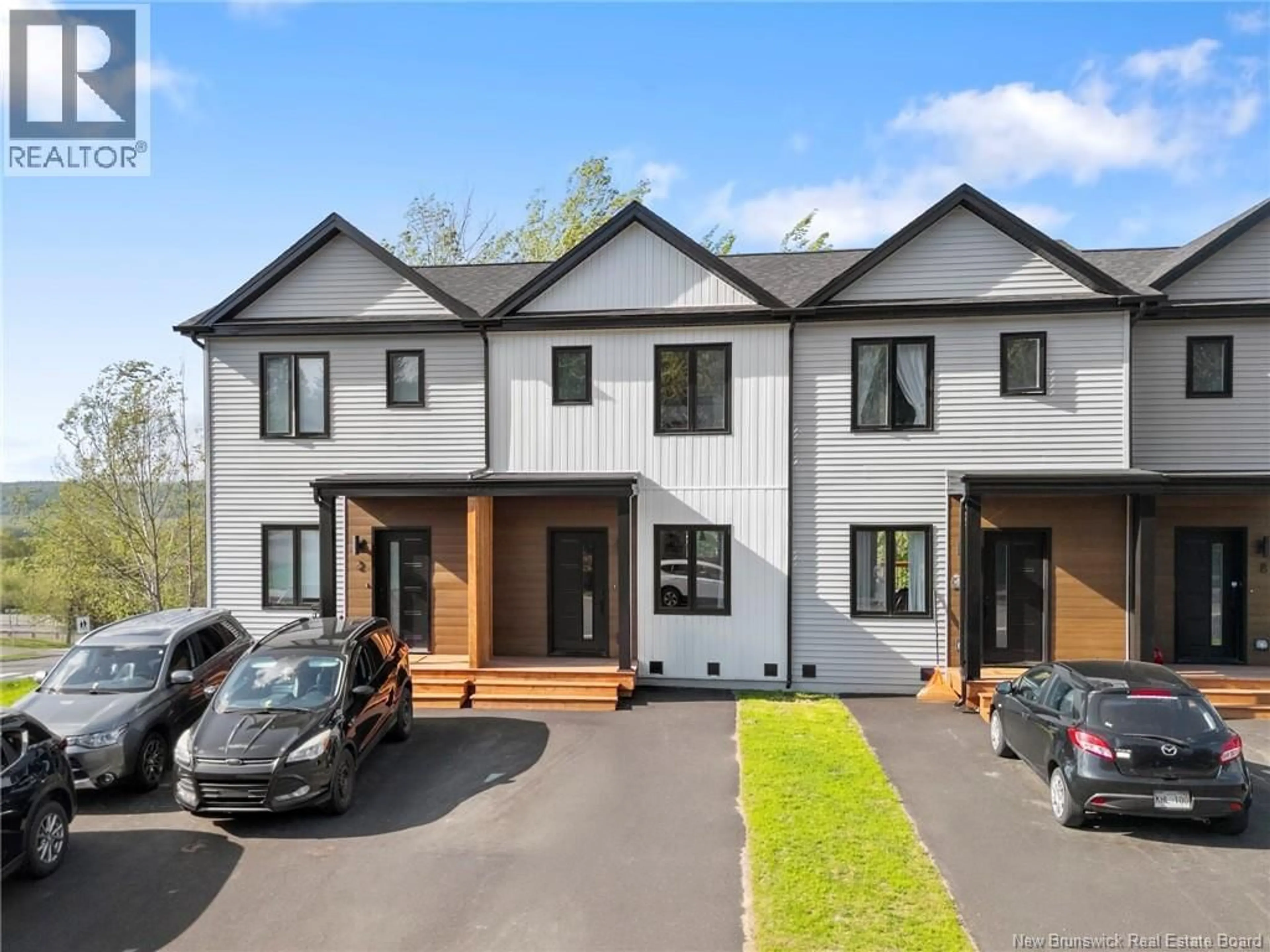 A pic from outside/outdoor area/front of a property/back of a property/a pic from drone, unknown for 4 WESTWOOD DRIVE, Fredericton New Brunswick E3C1K8