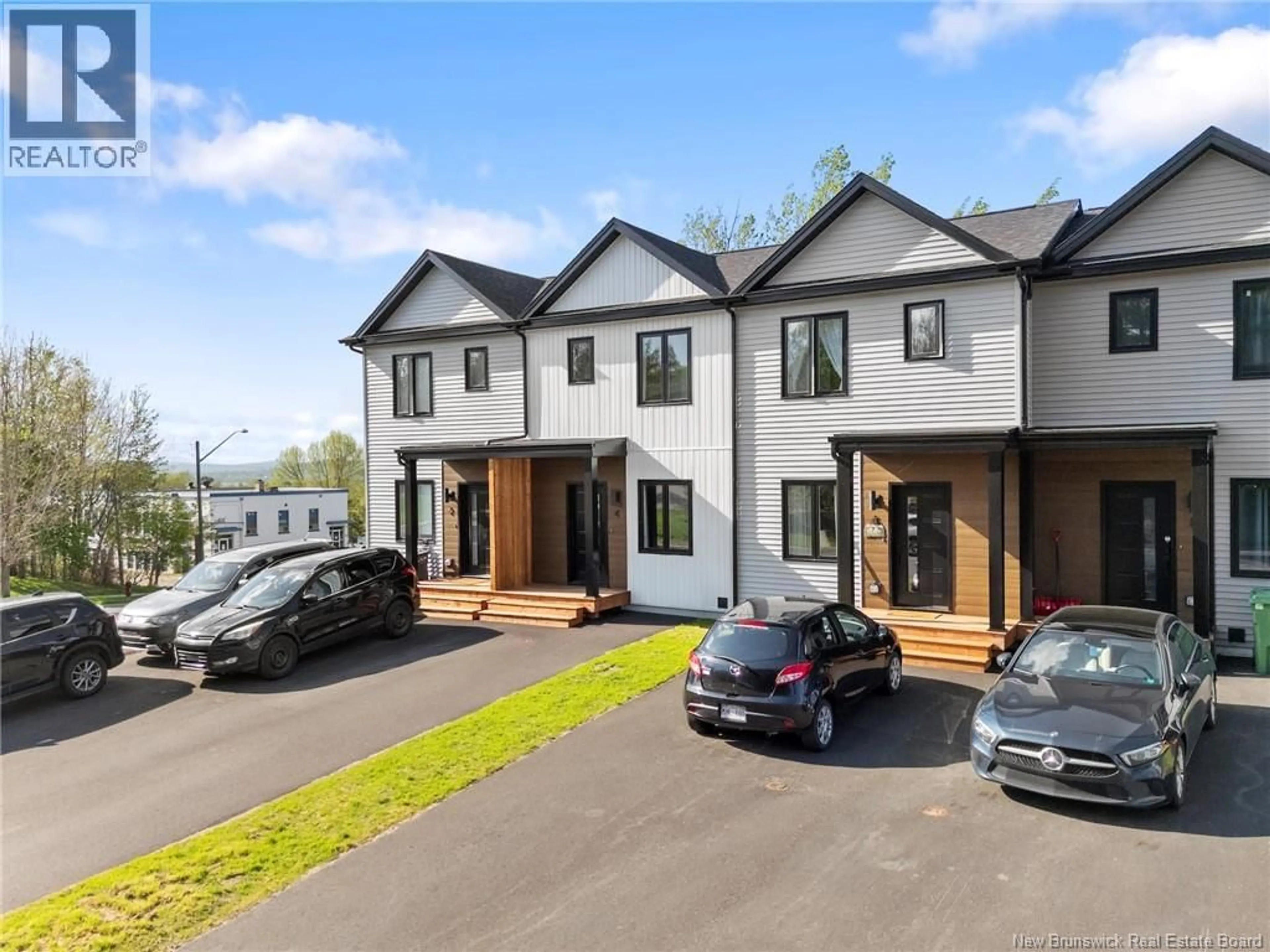 A pic from outside/outdoor area/front of a property/back of a property/a pic from drone, street for 4 WESTWOOD DRIVE, Fredericton New Brunswick E3C1K8