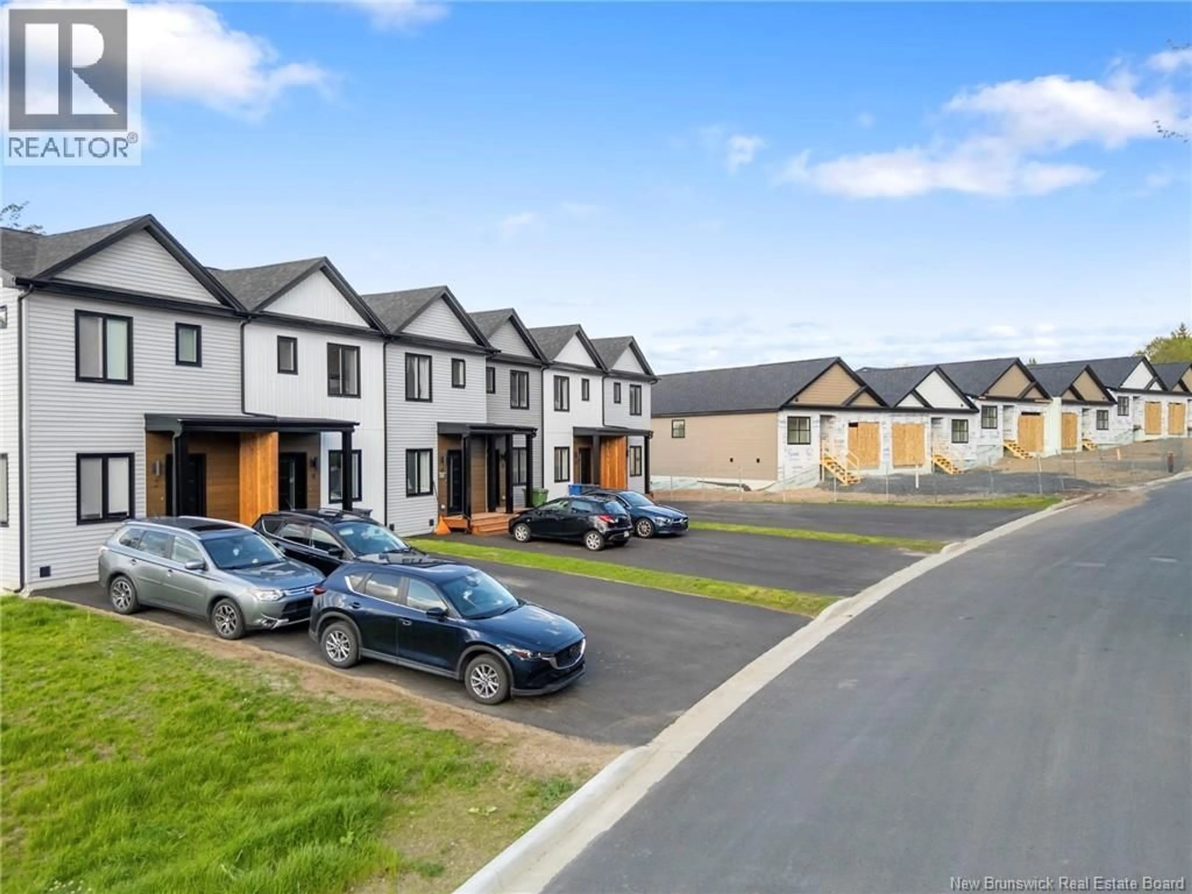 A pic from outside/outdoor area/front of a property/back of a property/a pic from drone, street for 4 WESTWOOD DRIVE, Fredericton New Brunswick E3C1K8