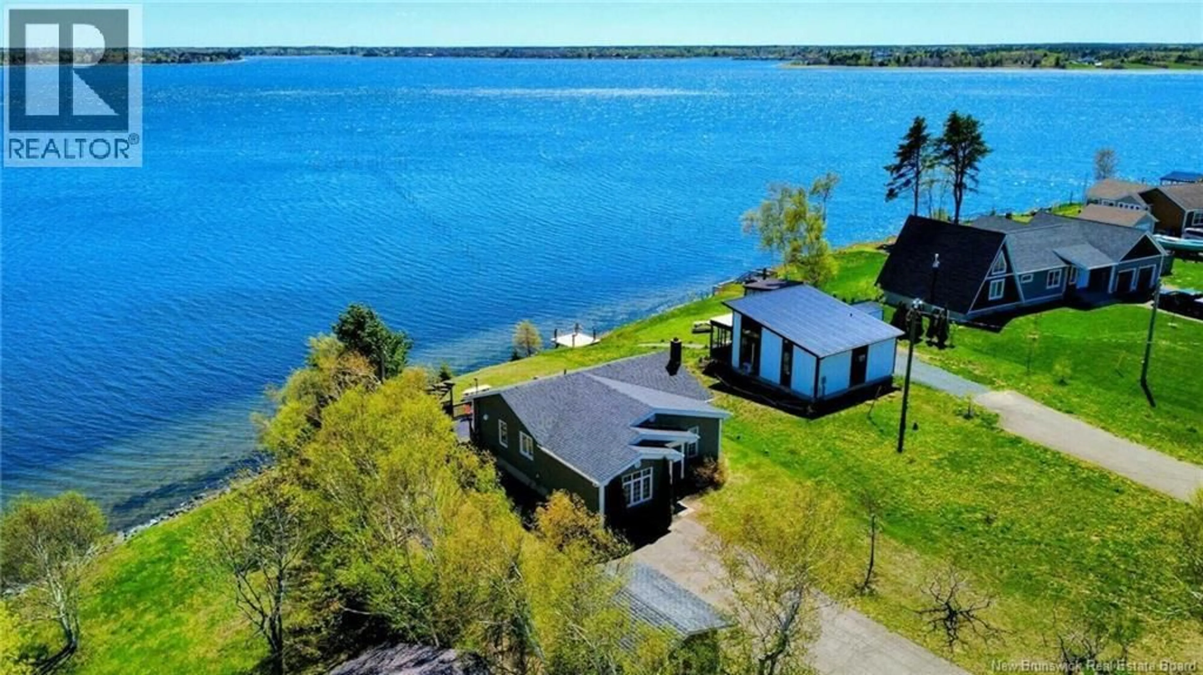 A pic from outside/outdoor area/front of a property/back of a property/a pic from drone, water/lake/river/ocean view for 948 RUE DES CHALETS STREET, Tracadie New Brunswick E1X1C4