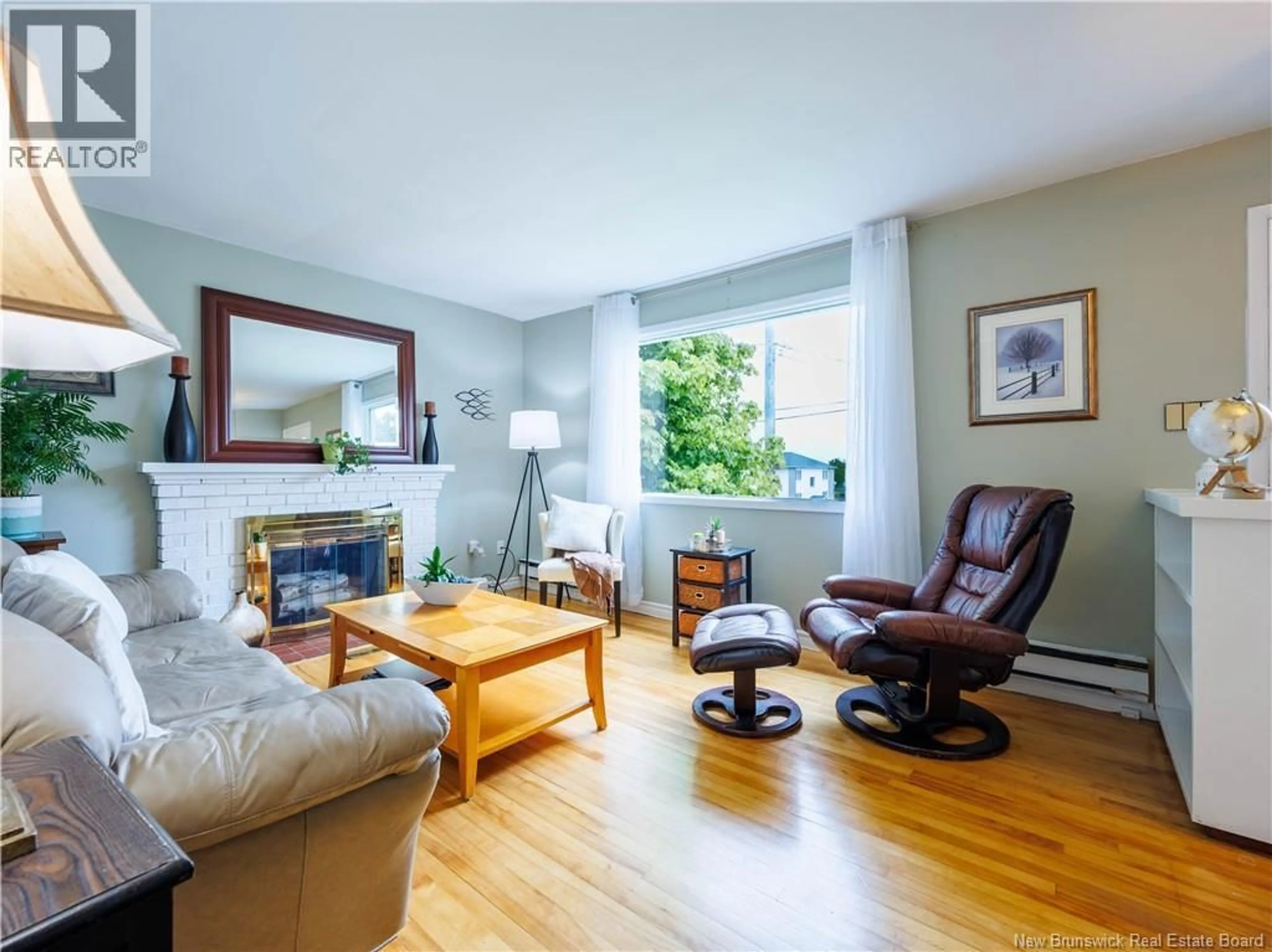 Living room with furniture, wood/laminate floor for 198 JONES STREET, Moncton New Brunswick E1C6K3