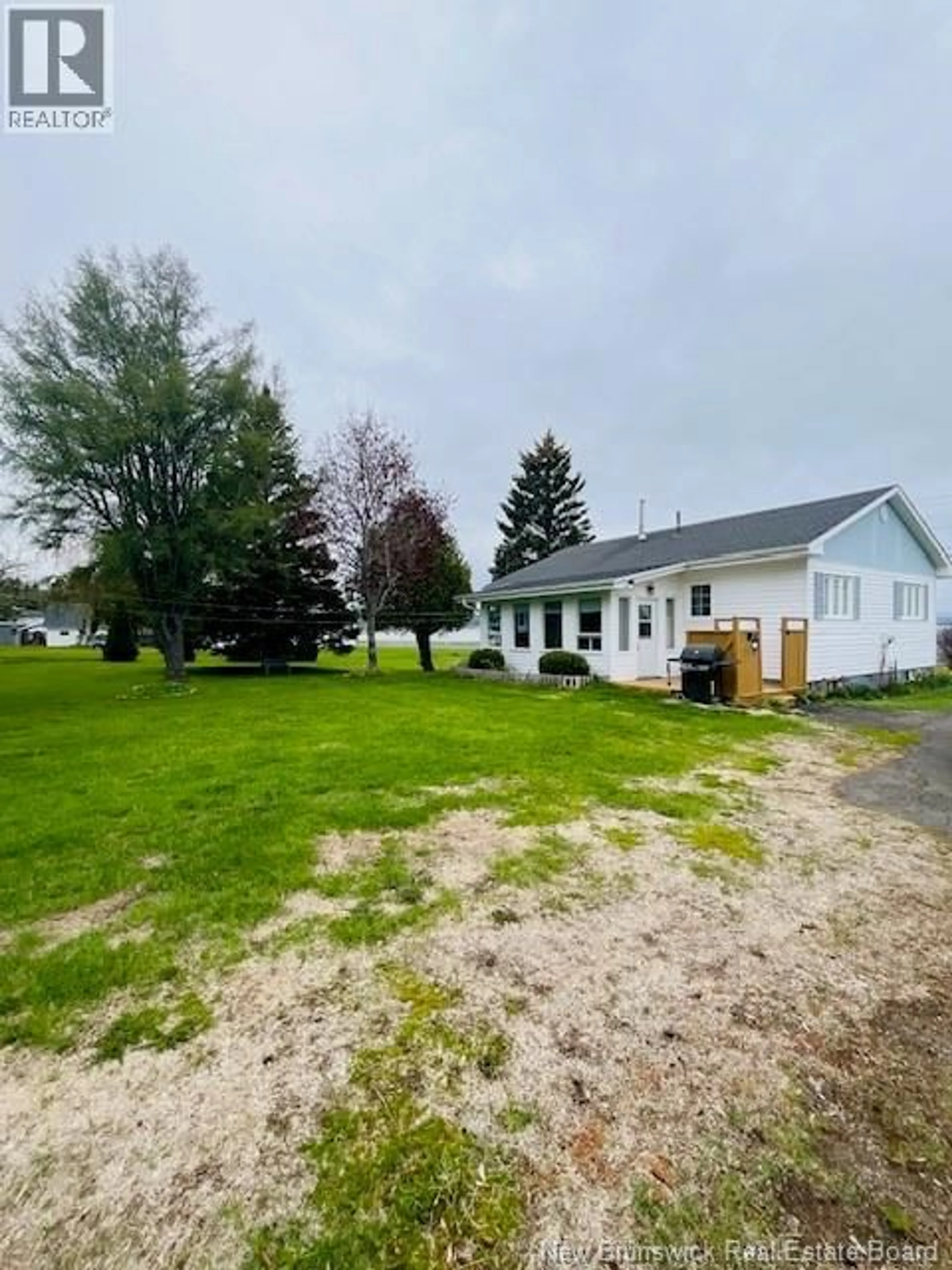 A pic from outside/outdoor area/front of a property/back of a property/a pic from drone, unknown for 94 CHALEUR STREET, Charlo New Brunswick E8E2E7