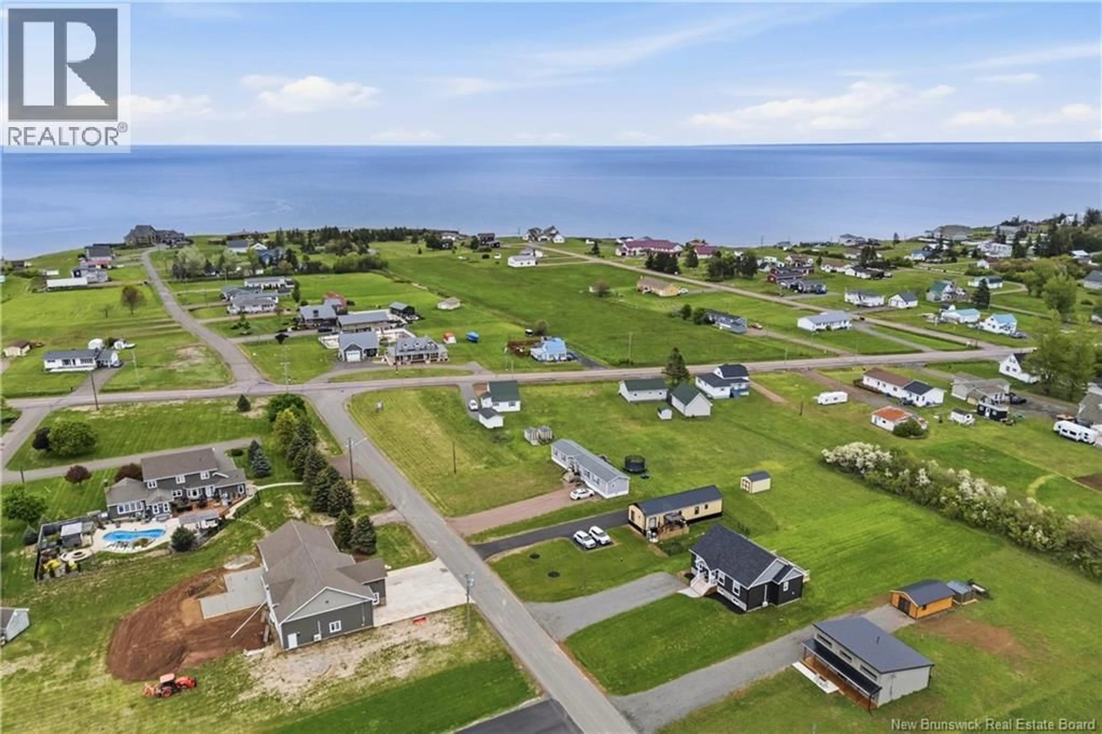 A pic from outside/outdoor area/front of a property/back of a property/a pic from drone, water/lake/river/ocean view for 18 BEDECHE STREET, Cap-Pelé New Brunswick E4N0G1