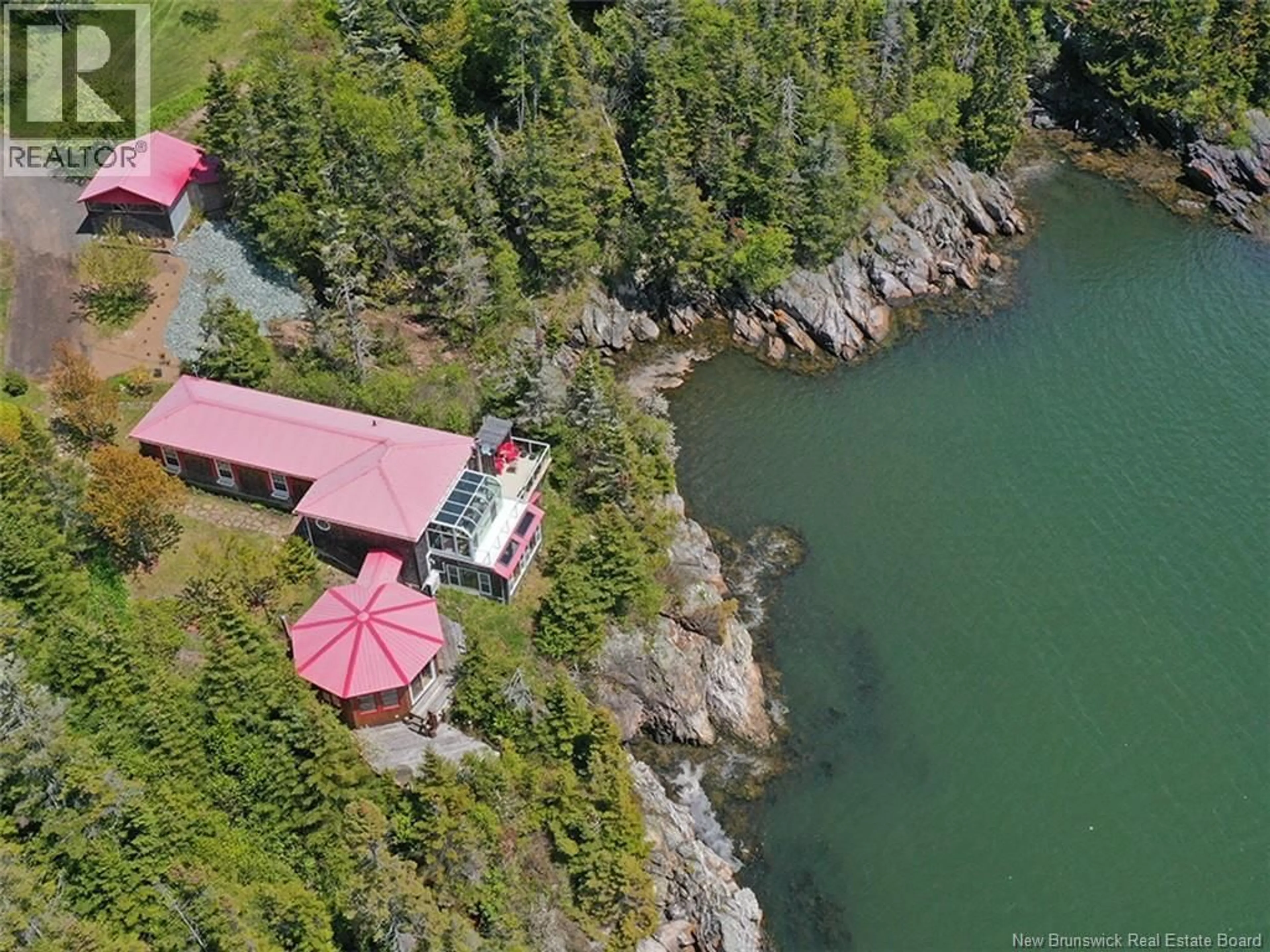 A pic from outside/outdoor area/front of a property/back of a property/a pic from drone, water/lake/river/ocean view for 1456 HIGHWAY 790, Dipper Harbour New Brunswick E5J1X9