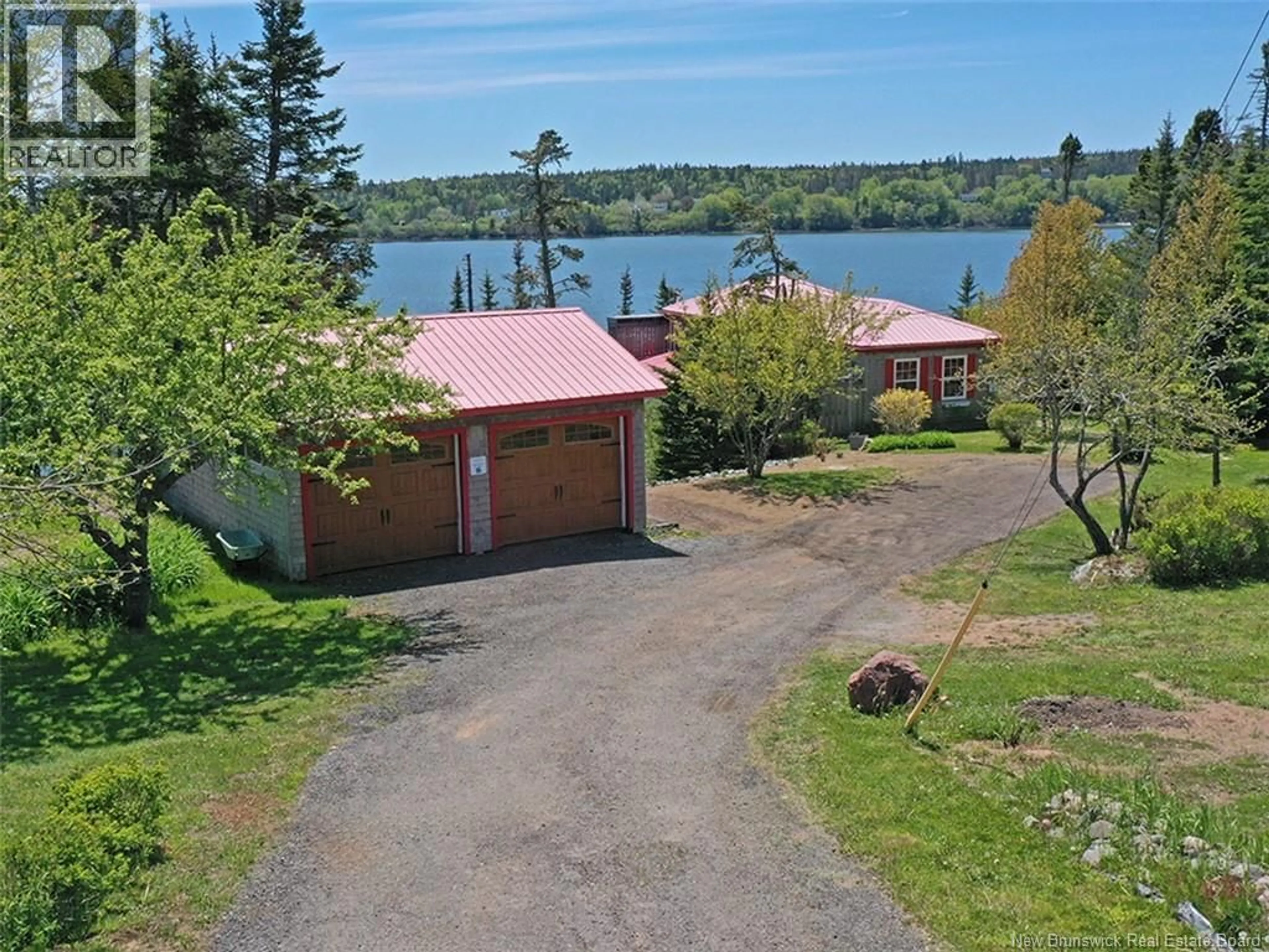 A pic from outside/outdoor area/front of a property/back of a property/a pic from drone, water/lake/river/ocean view for 1456 HIGHWAY 790, Dipper Harbour New Brunswick E5J1X9