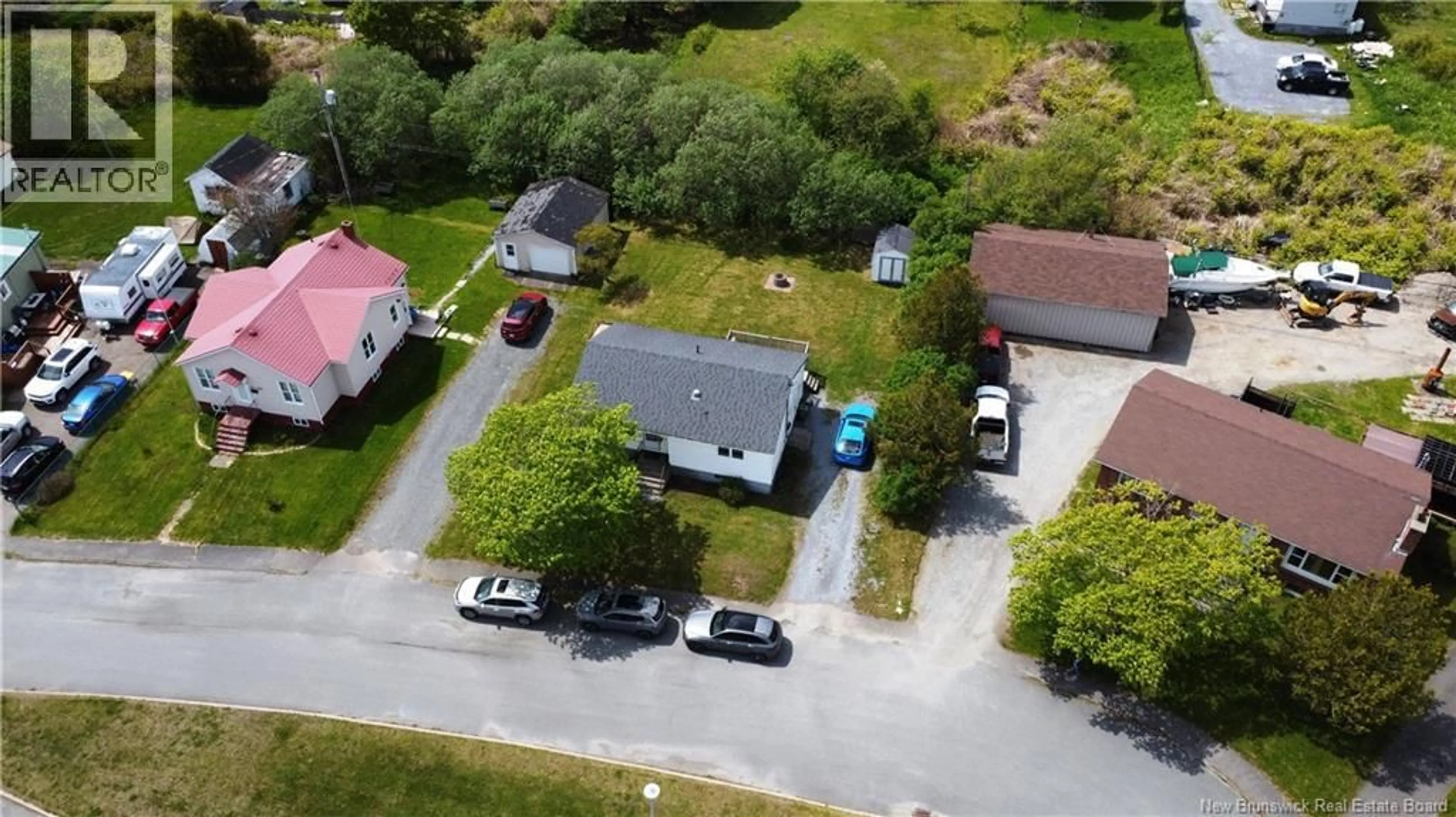 A pic from outside/outdoor area/front of a property/back of a property/a pic from drone, street for 340 BEACONSFIELD CRESCENT, Saint John New Brunswick E2M2H8