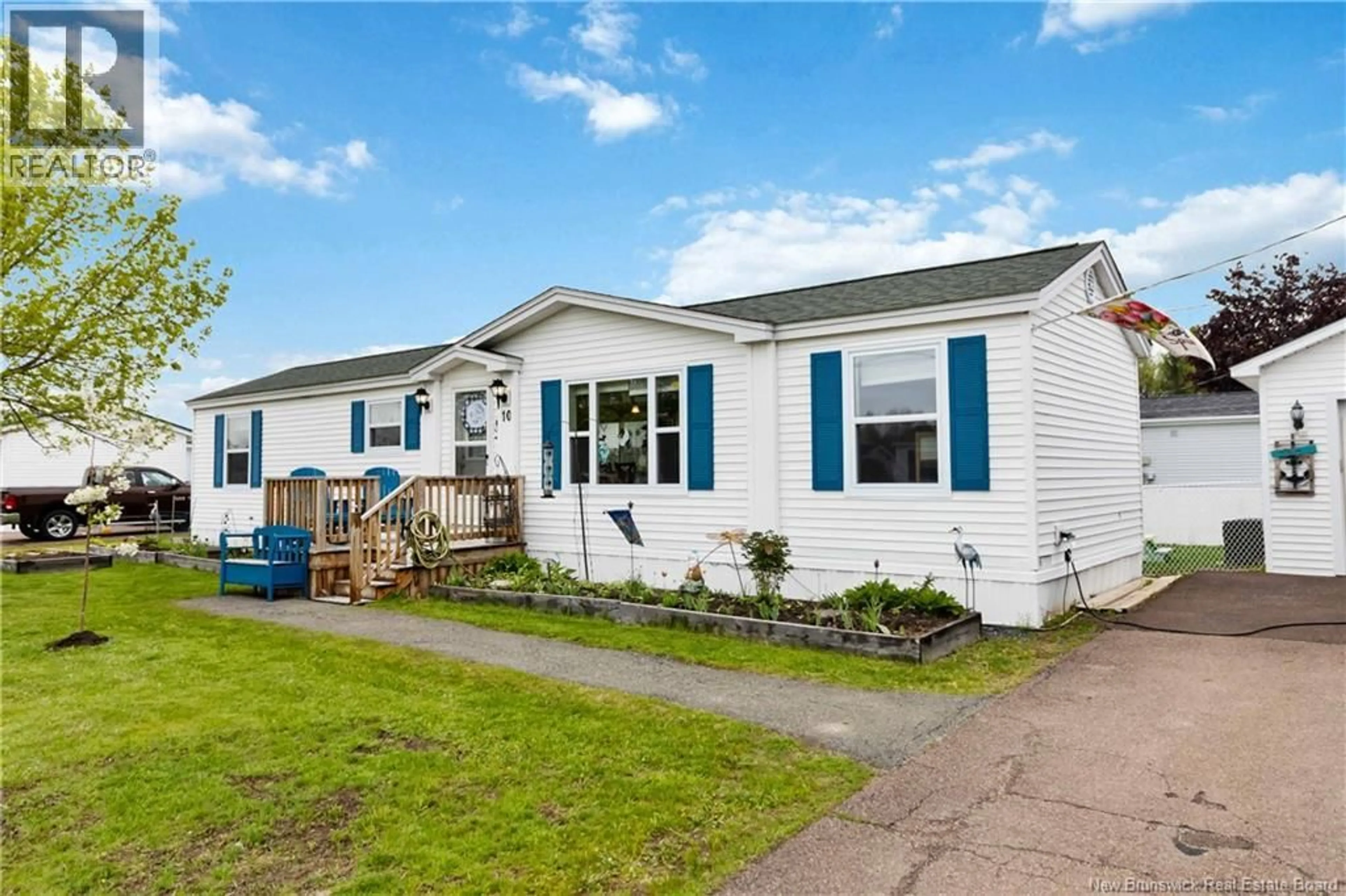 Home with vinyl exterior material, street for 10 PERIDOT STREET, Moncton New Brunswick E1H3E5