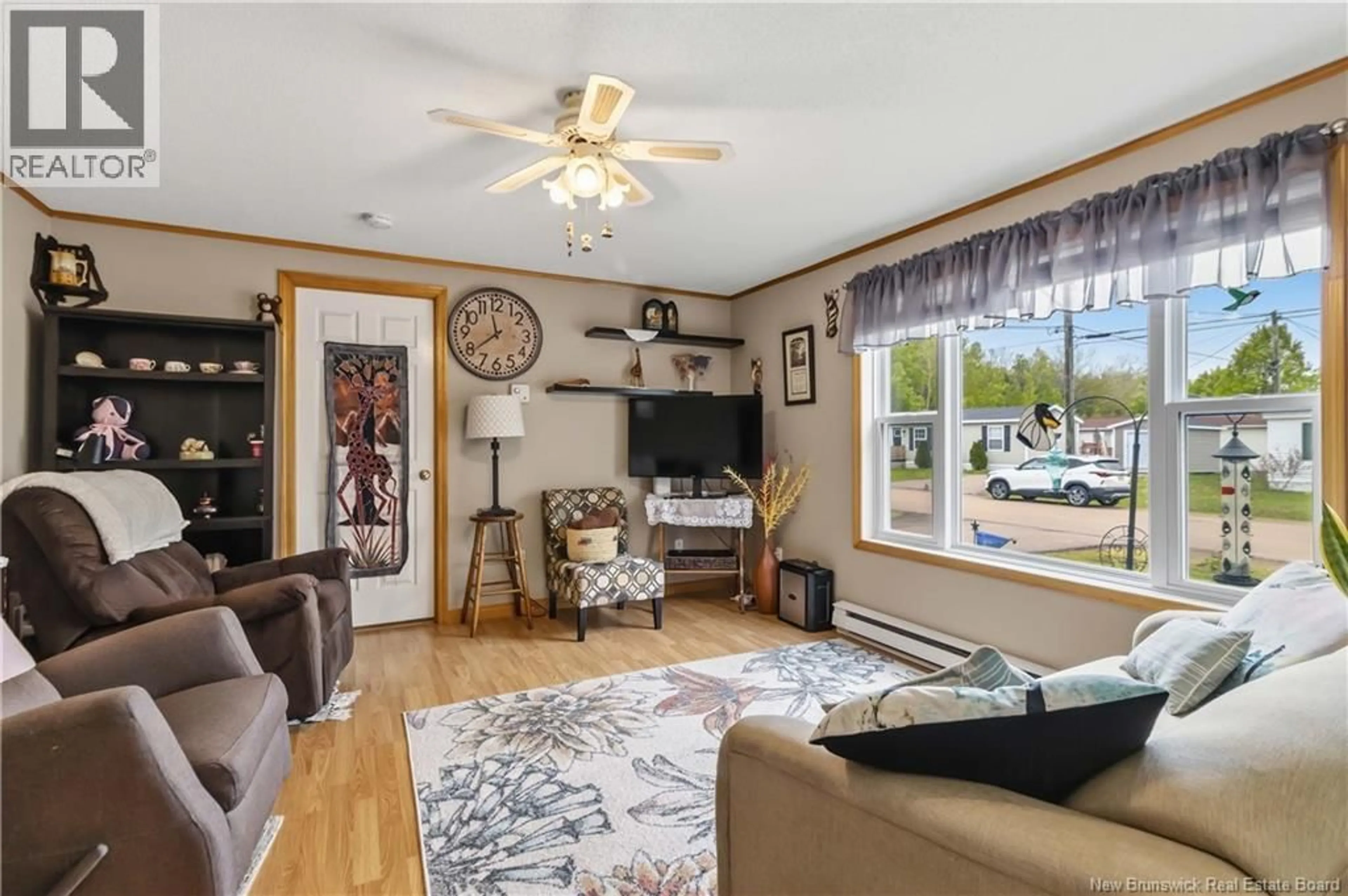 Living room with furniture, wood/laminate floor for 10 PERIDOT STREET, Moncton New Brunswick E1H3E5