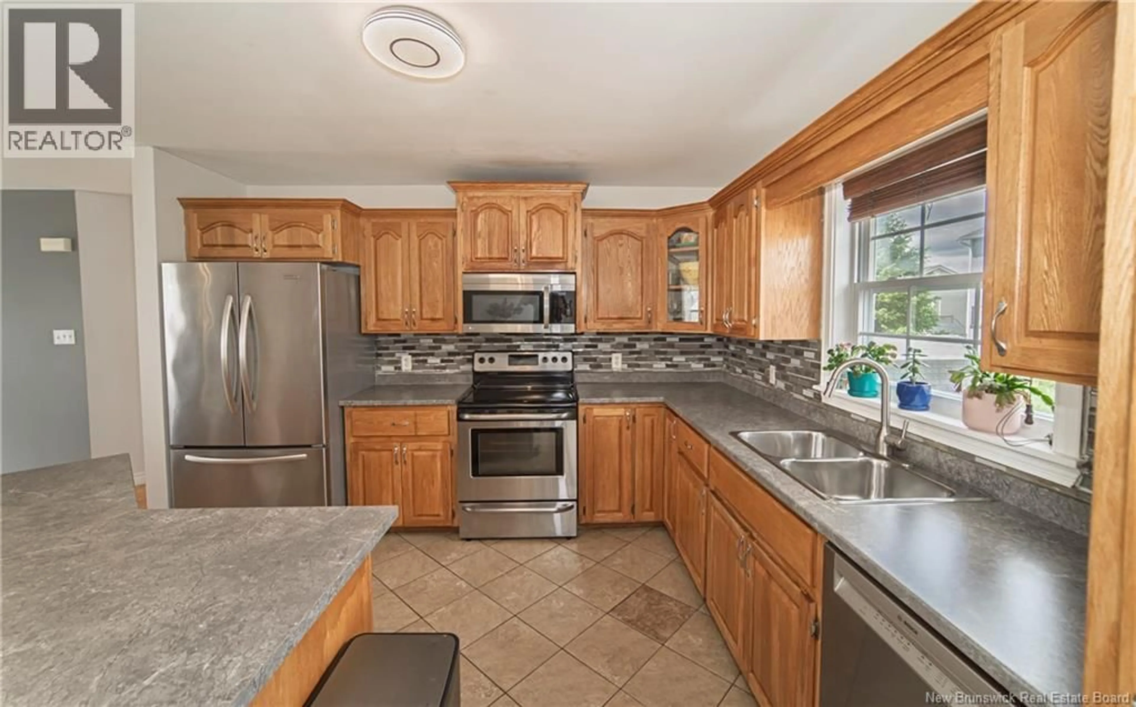 Standard kitchen, ceramic/tile floor for 66 WATLING CRESCENT, Oromocto New Brunswick E2V4M8