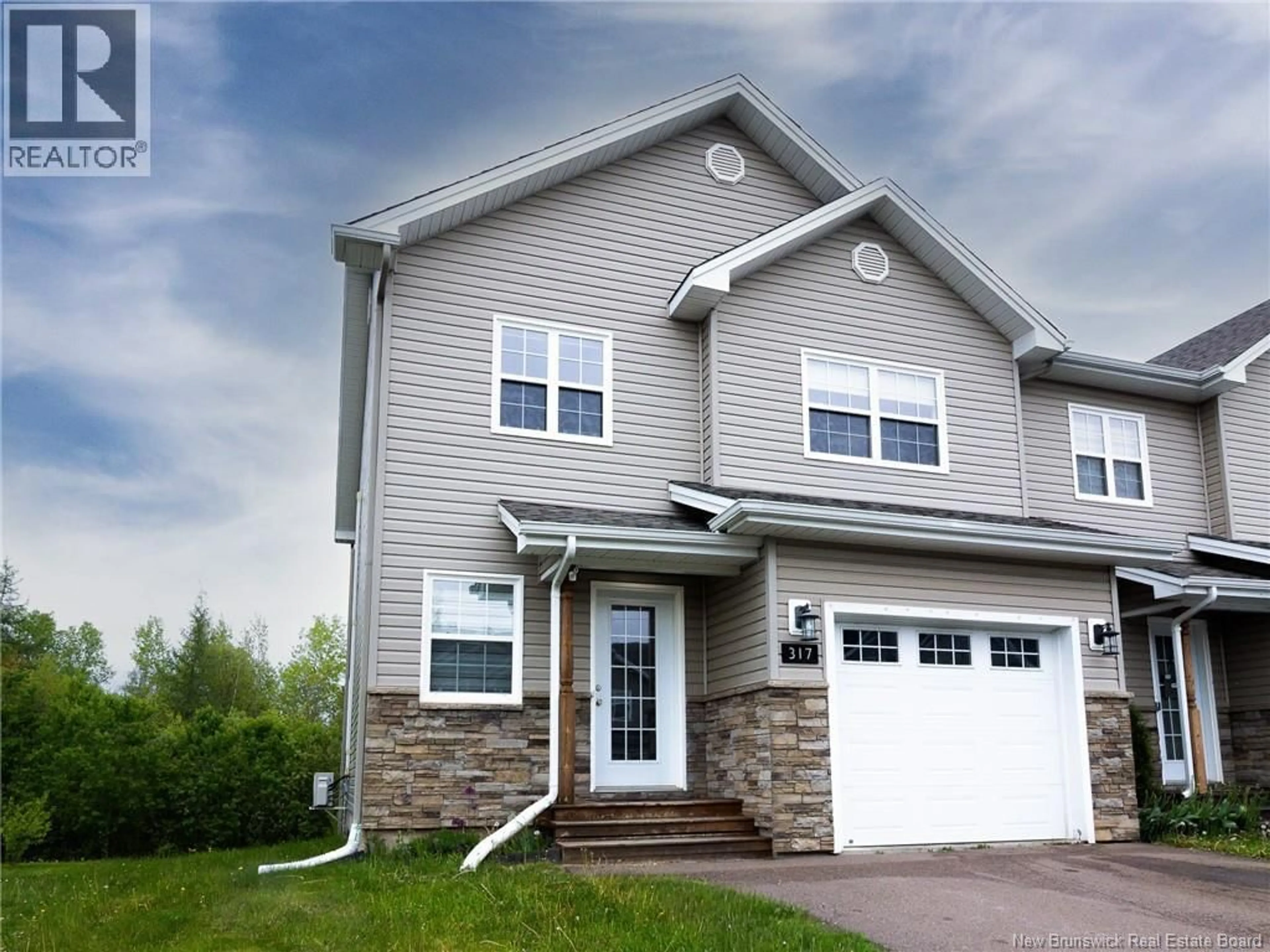 Home with vinyl exterior material, building for 317 DOLBEAU, Dieppe New Brunswick E1A9P9
