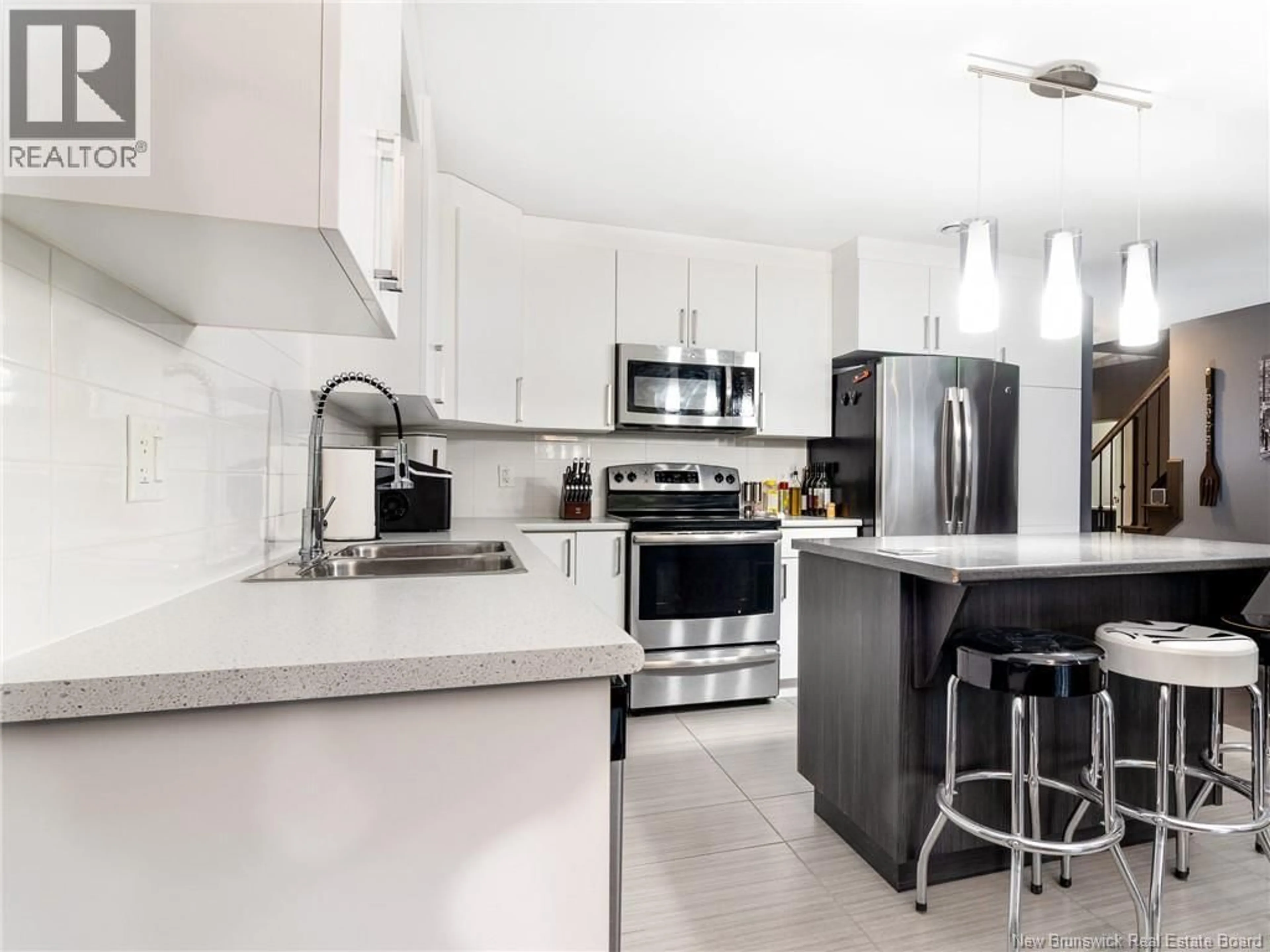 Open concept kitchen, ceramic/tile floor for 317 DOLBEAU, Dieppe New Brunswick E1A9P9