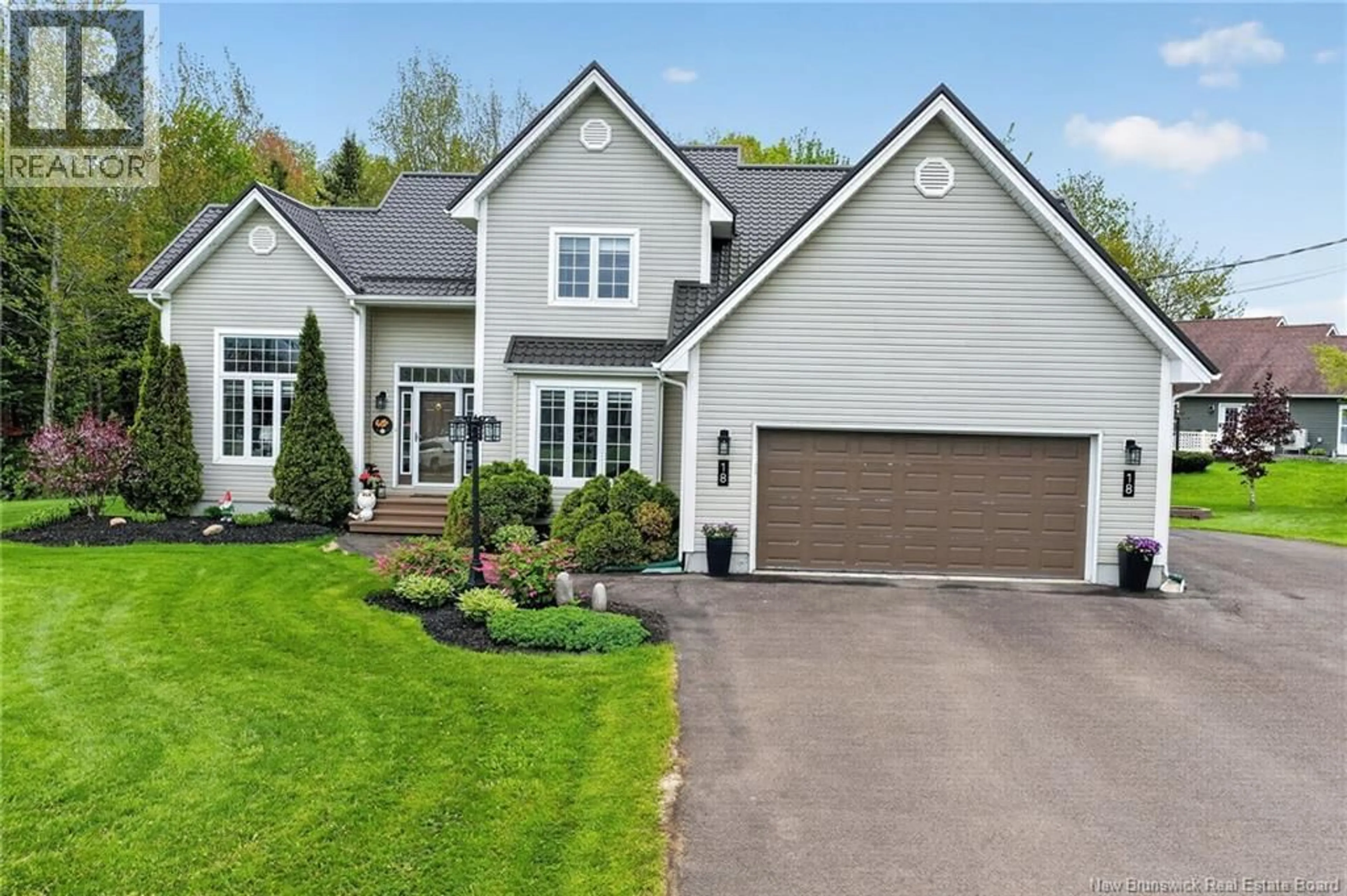 Home with vinyl exterior material, street for 18 LAJOIE, Saint-Antoine New Brunswick E4V1K2
