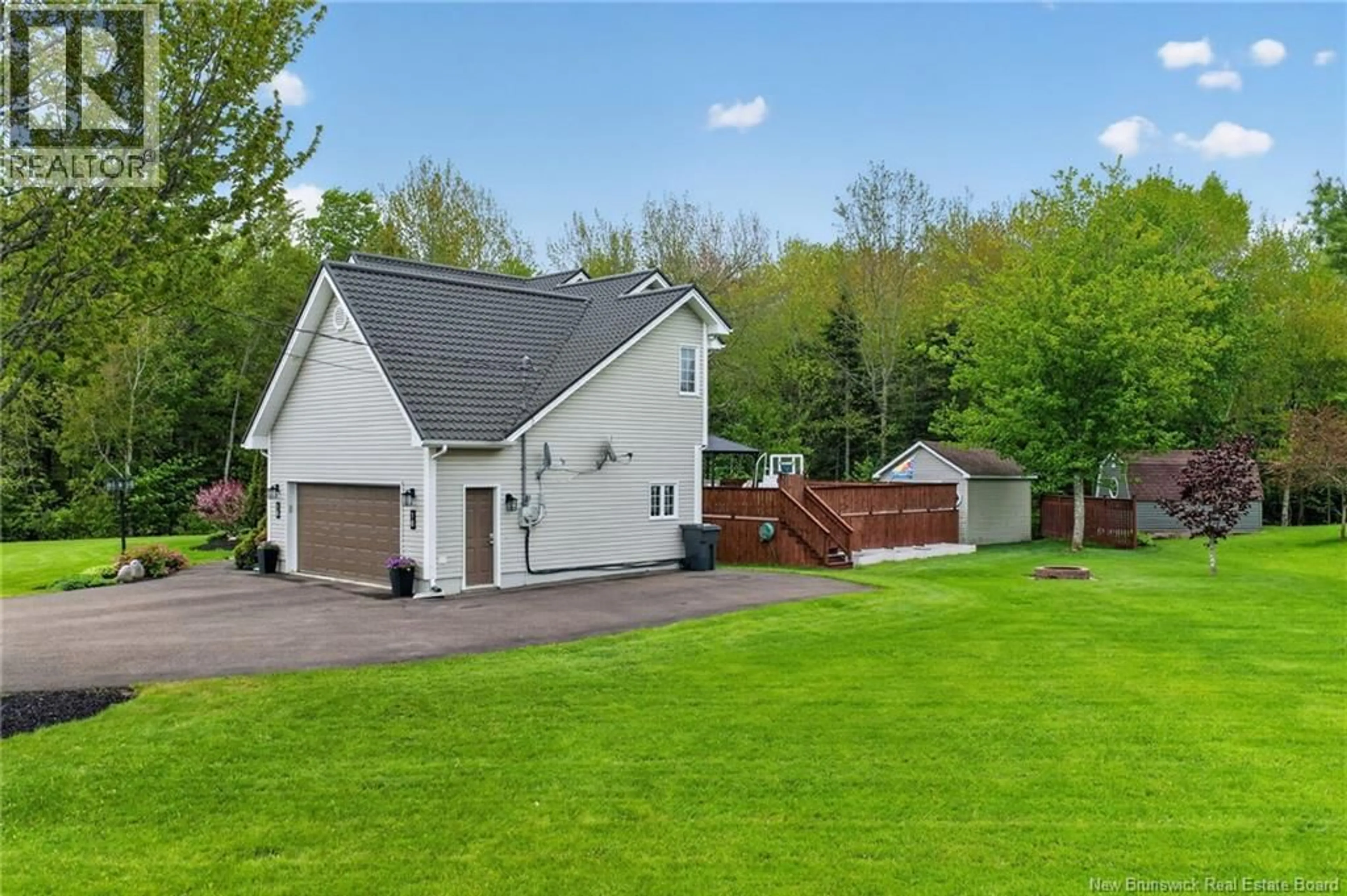 A pic from outside/outdoor area/front of a property/back of a property/a pic from drone, street for 18 LAJOIE, Saint-Antoine New Brunswick E4V1K2