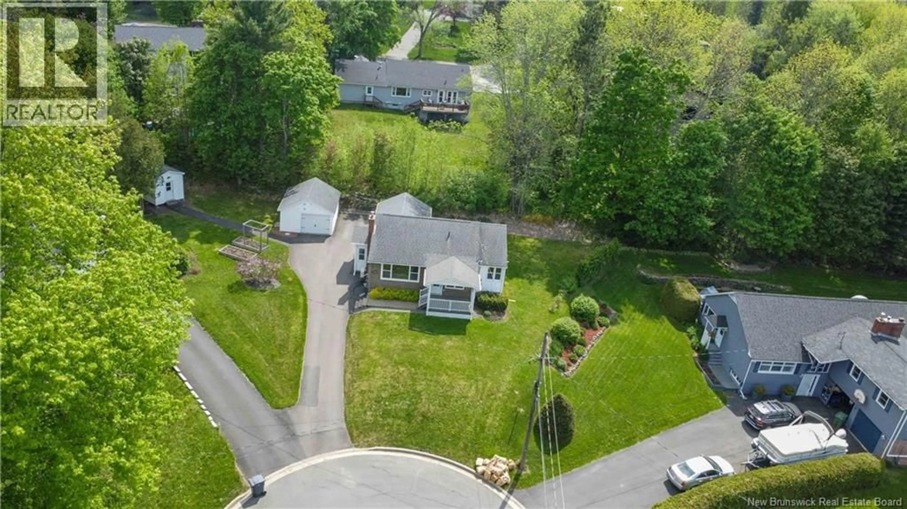 A pic from outside/outdoor area/front of a property/back of a property/a pic from drone, street for 10 SHAMROCK TERRACE, Fredericton New Brunswick E3B2S4