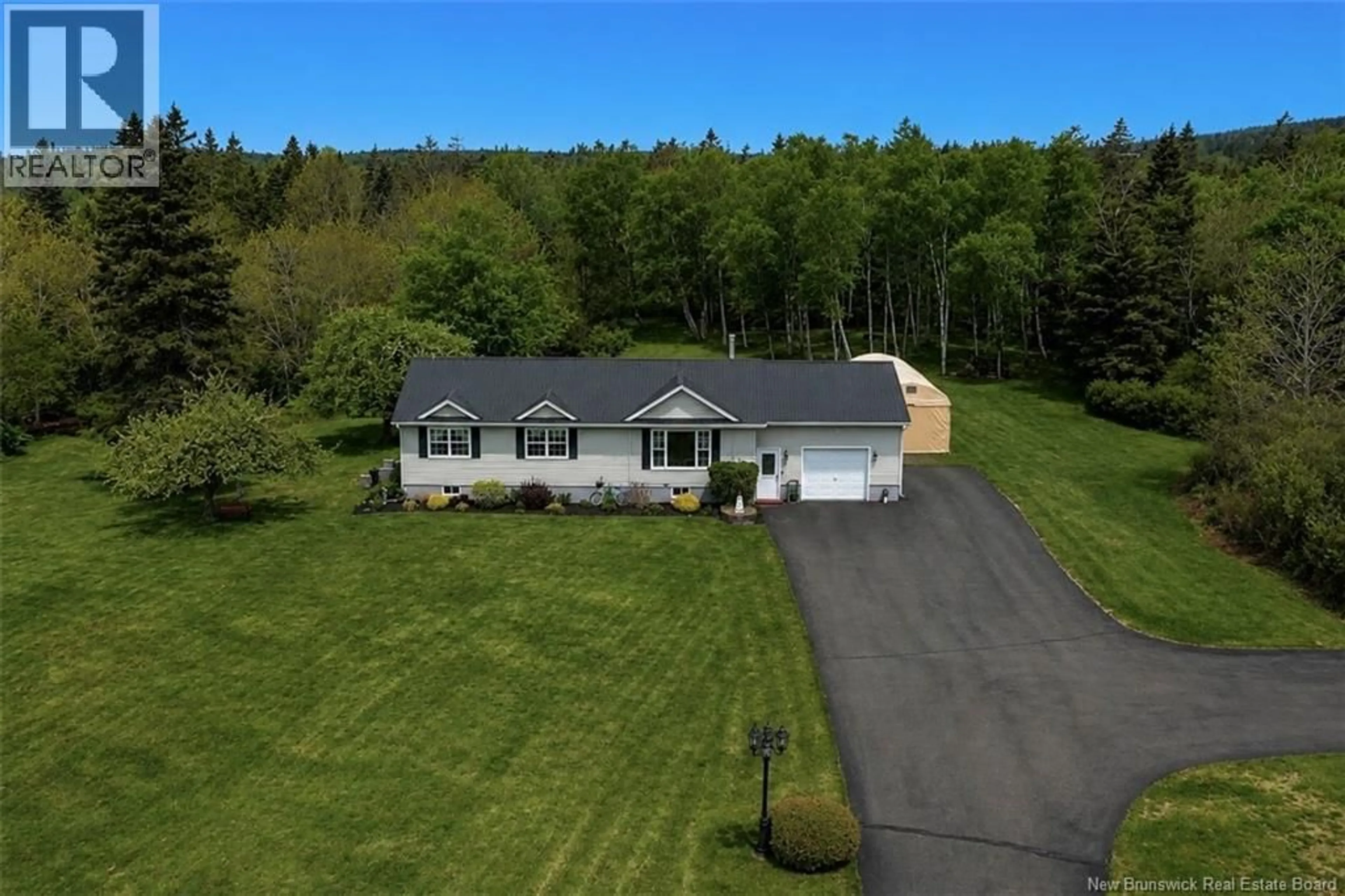 A pic from outside/outdoor area/front of a property/back of a property/a pic from drone, unknown for 558 ROUTE 776, Grand Manan New Brunswick E5G2C9