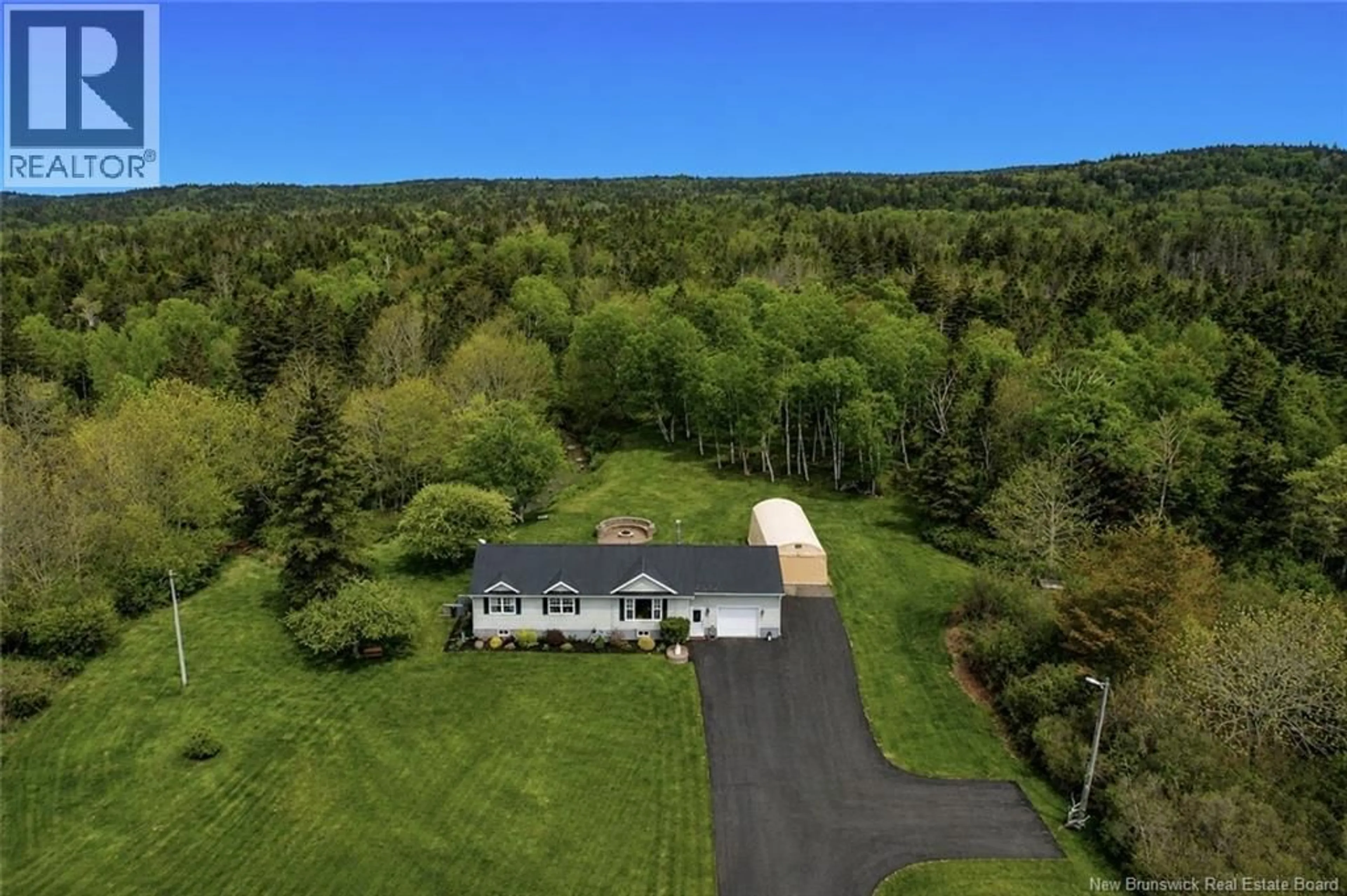 A pic from outside/outdoor area/front of a property/back of a property/a pic from drone, unknown for 558 ROUTE 776, Grand Manan New Brunswick E5G2C9