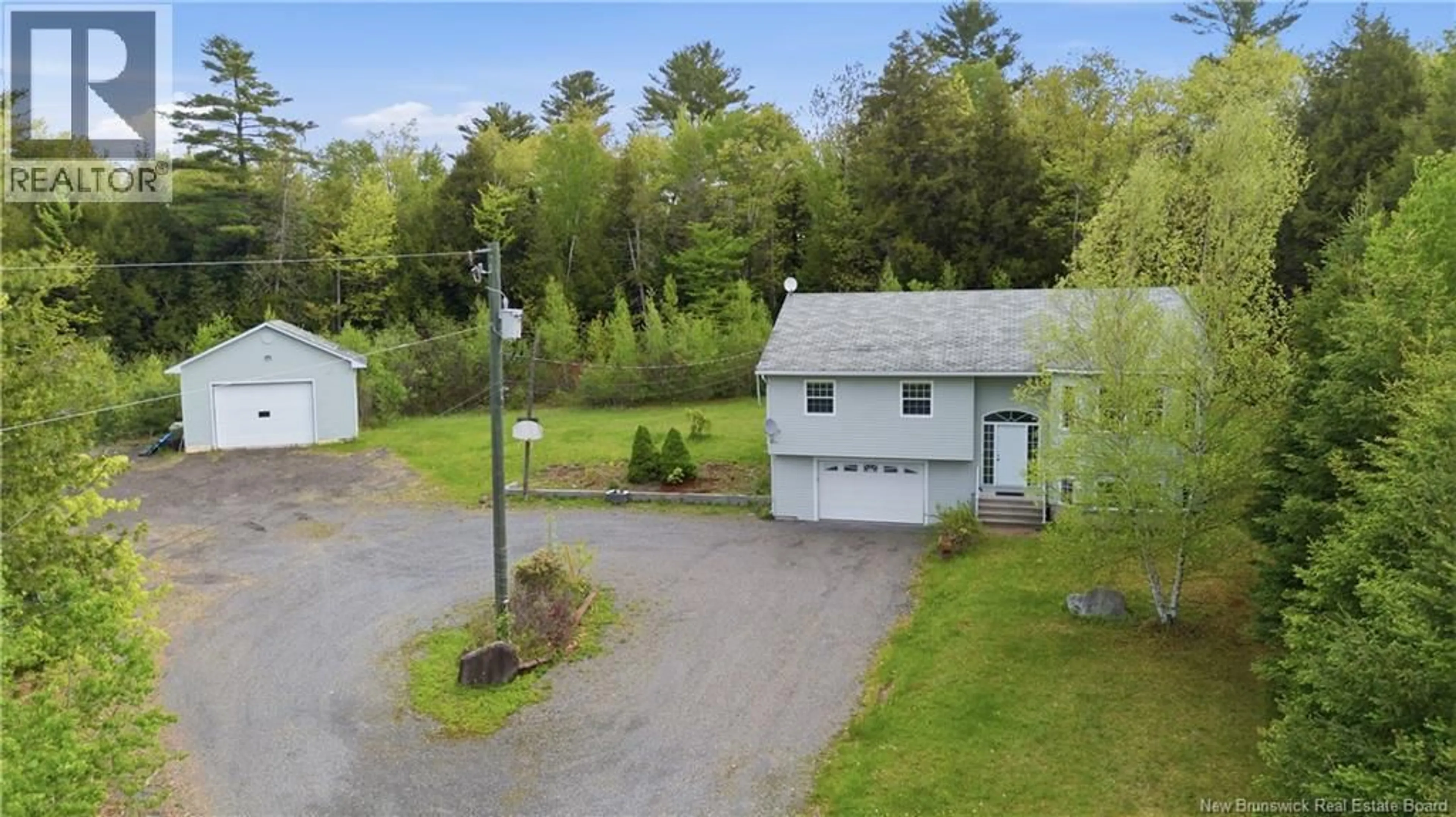 A pic from outside/outdoor area/front of a property/back of a property/a pic from drone, unknown for 152 CLAUDIE ROAD, Fredericton New Brunswick E3G7T7