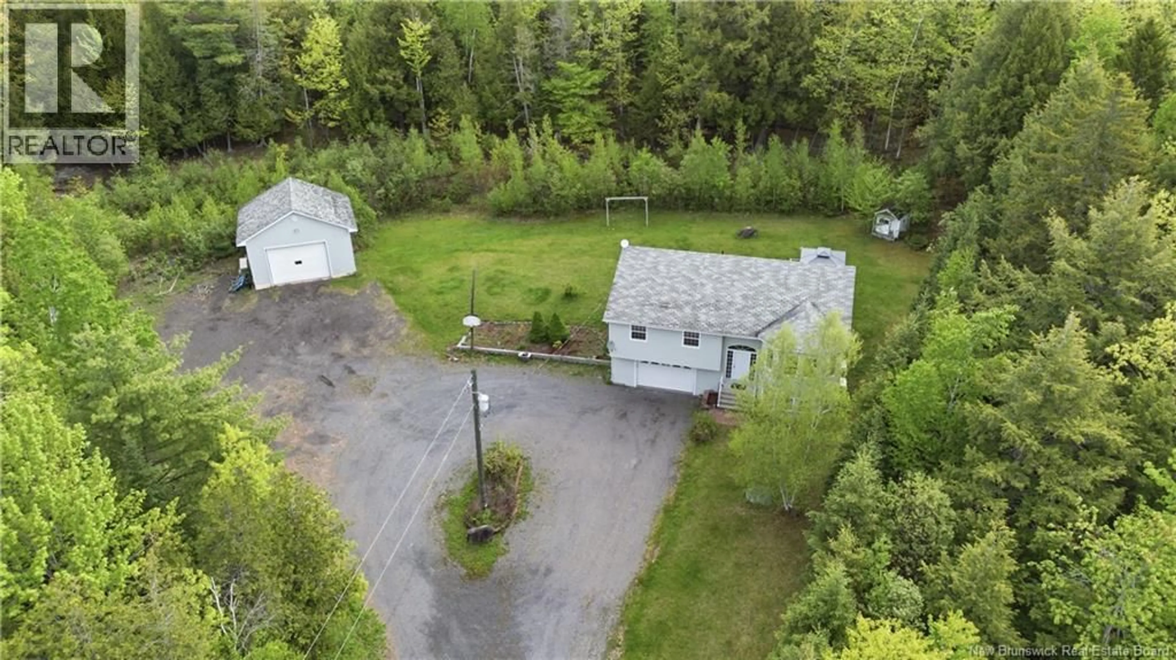 A pic from outside/outdoor area/front of a property/back of a property/a pic from drone, building for 152 CLAUDIE ROAD, Fredericton New Brunswick E3G7T7