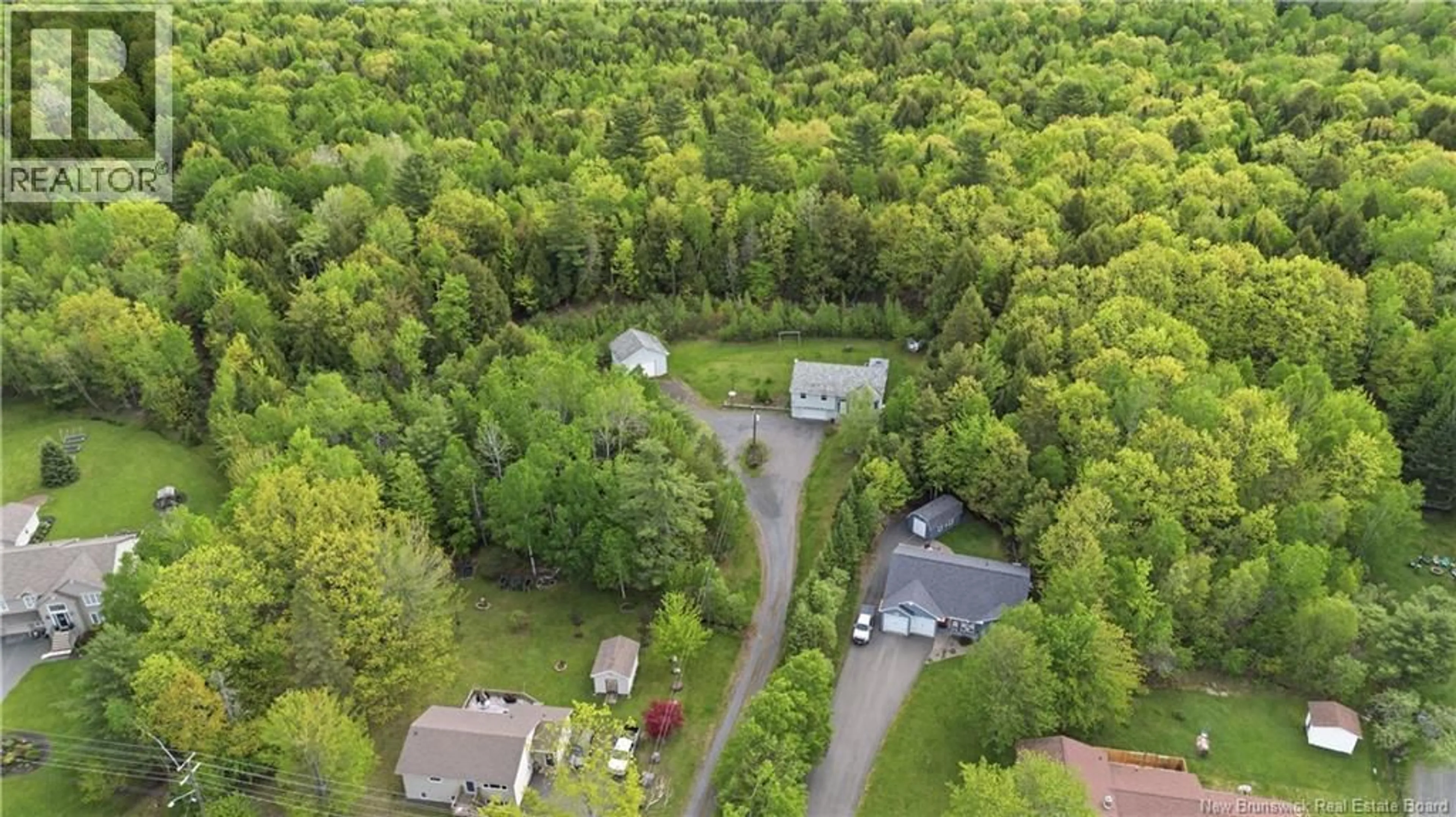 A pic from outside/outdoor area/front of a property/back of a property/a pic from drone, forest/trees view for 152 CLAUDIE ROAD, Fredericton New Brunswick E3G7T7